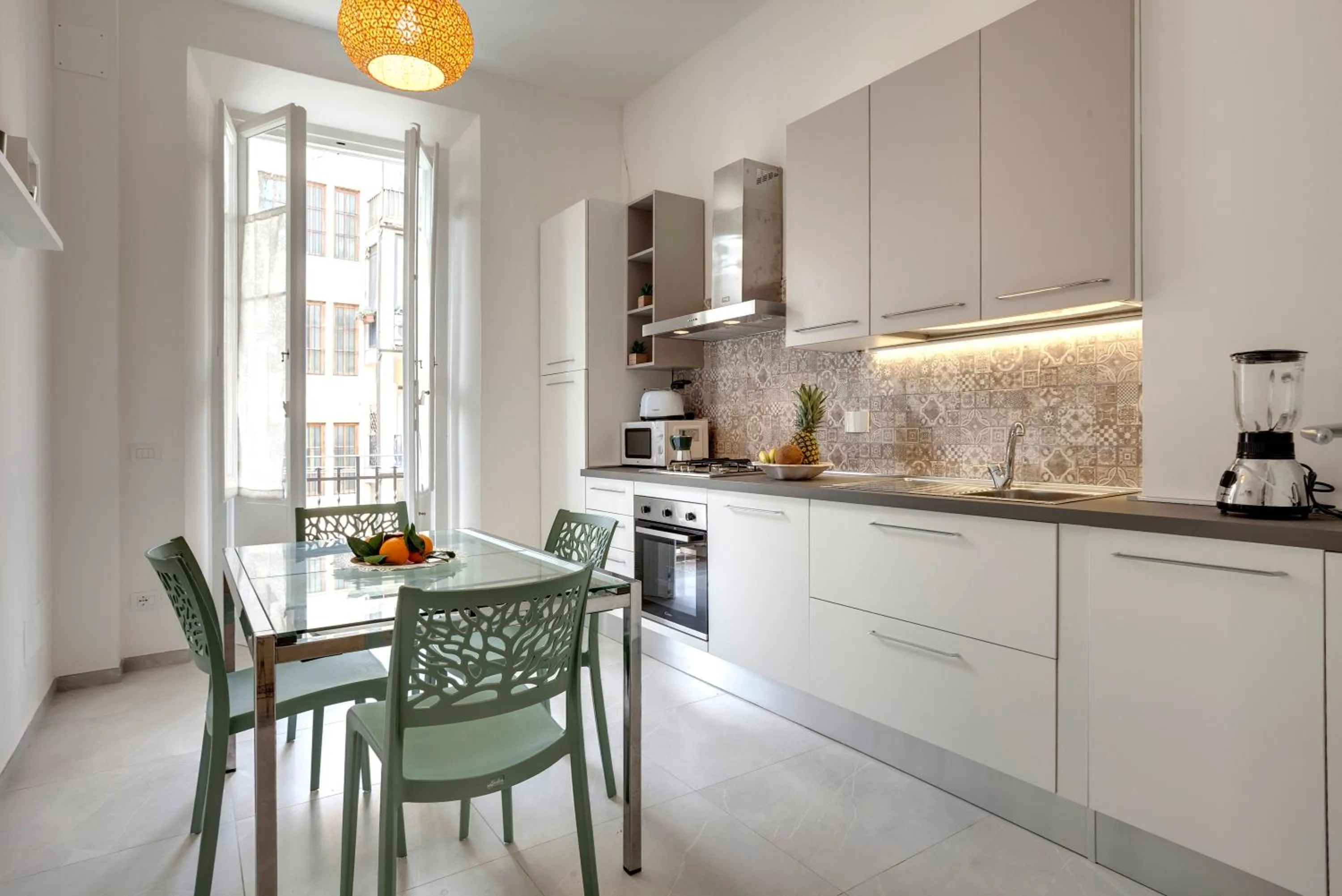 Kitchen or kitchenette in Magenta Apartment by Mamo Florence