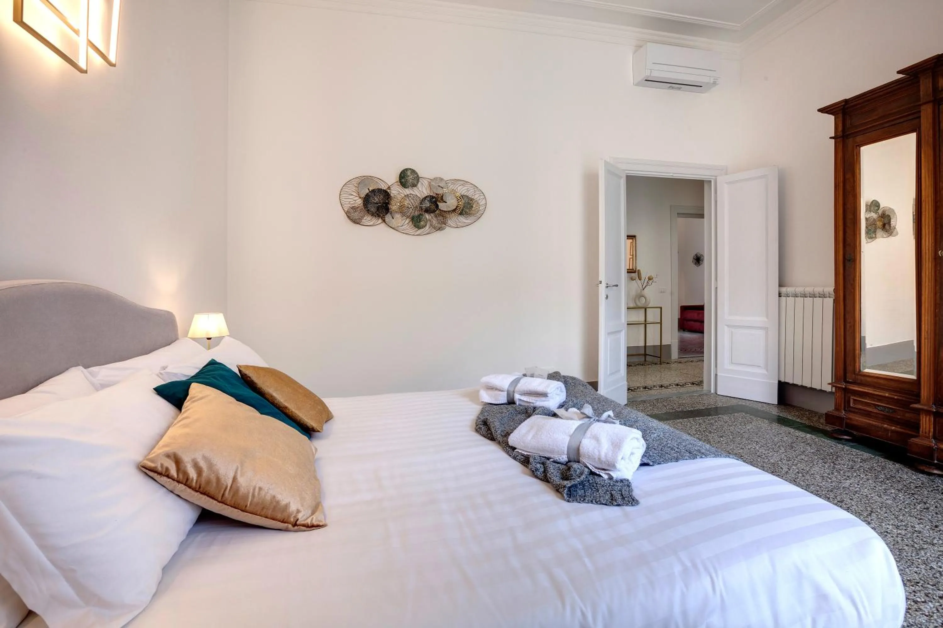 Bed in Magenta Apartment by Mamo Florence