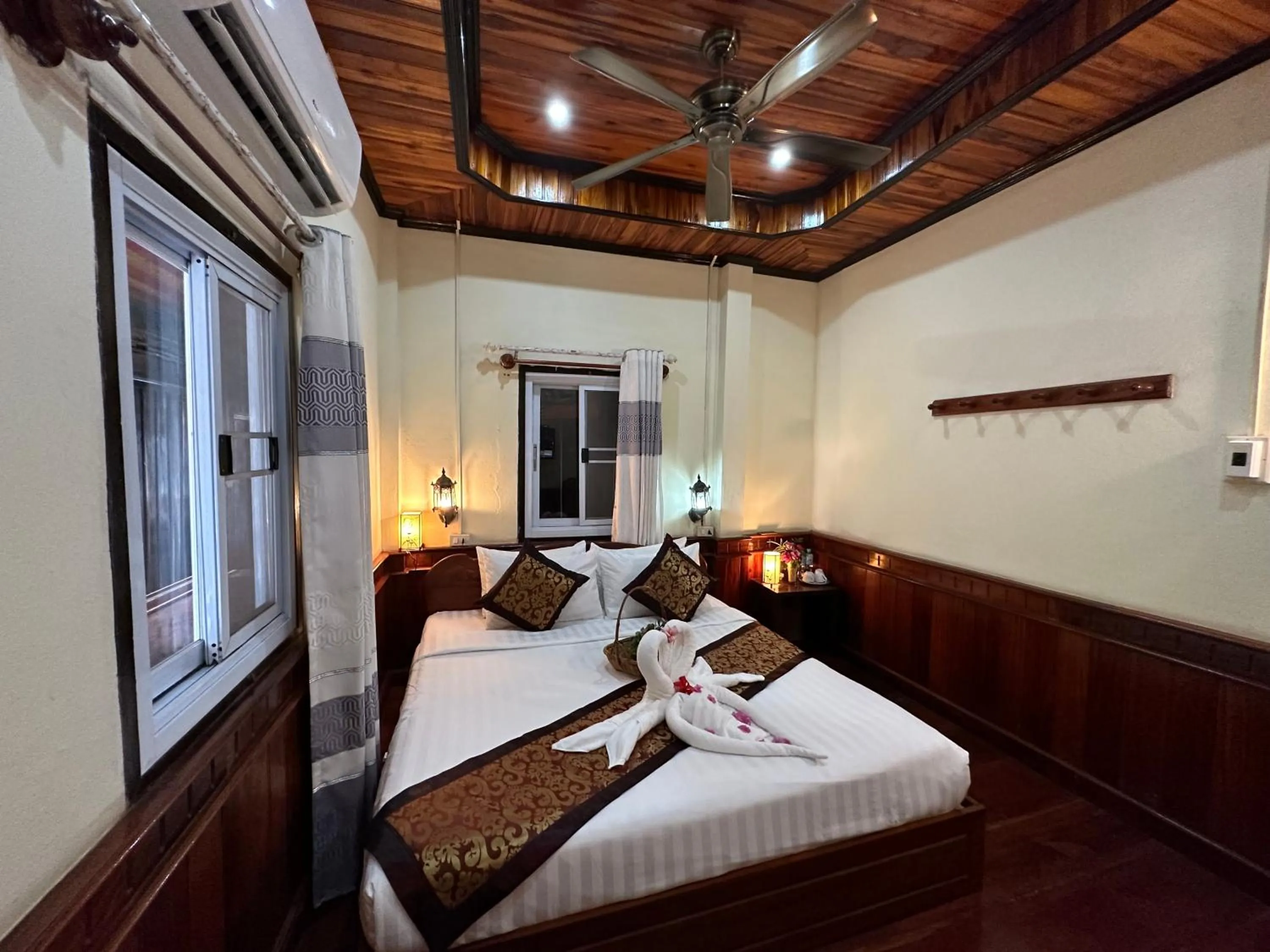 Bed in Villa Thida Mekong Riverside