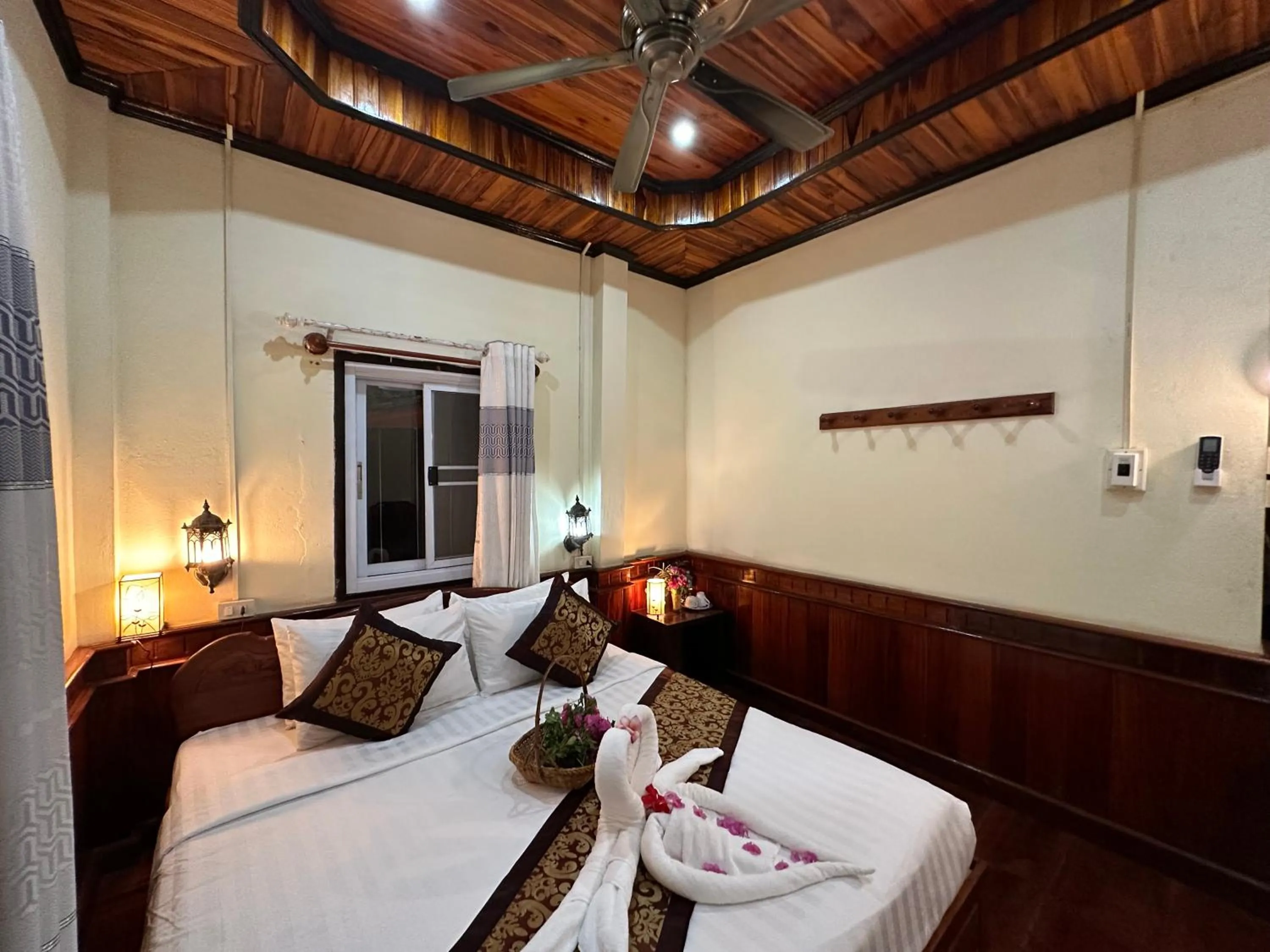 Bed in Villa Thida Mekong Riverside