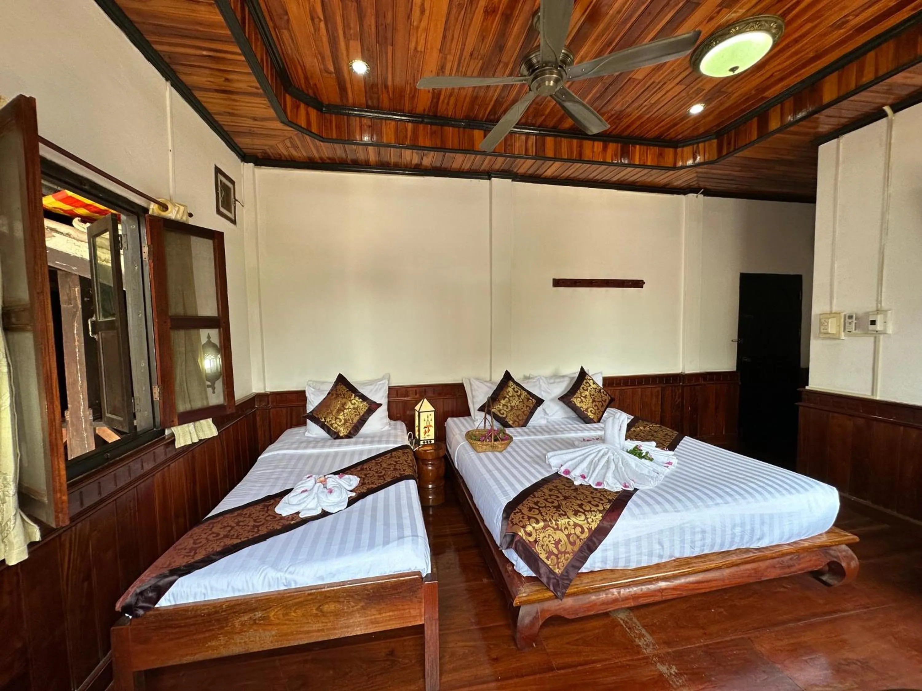 Bed in Villa Thida Mekong Riverside