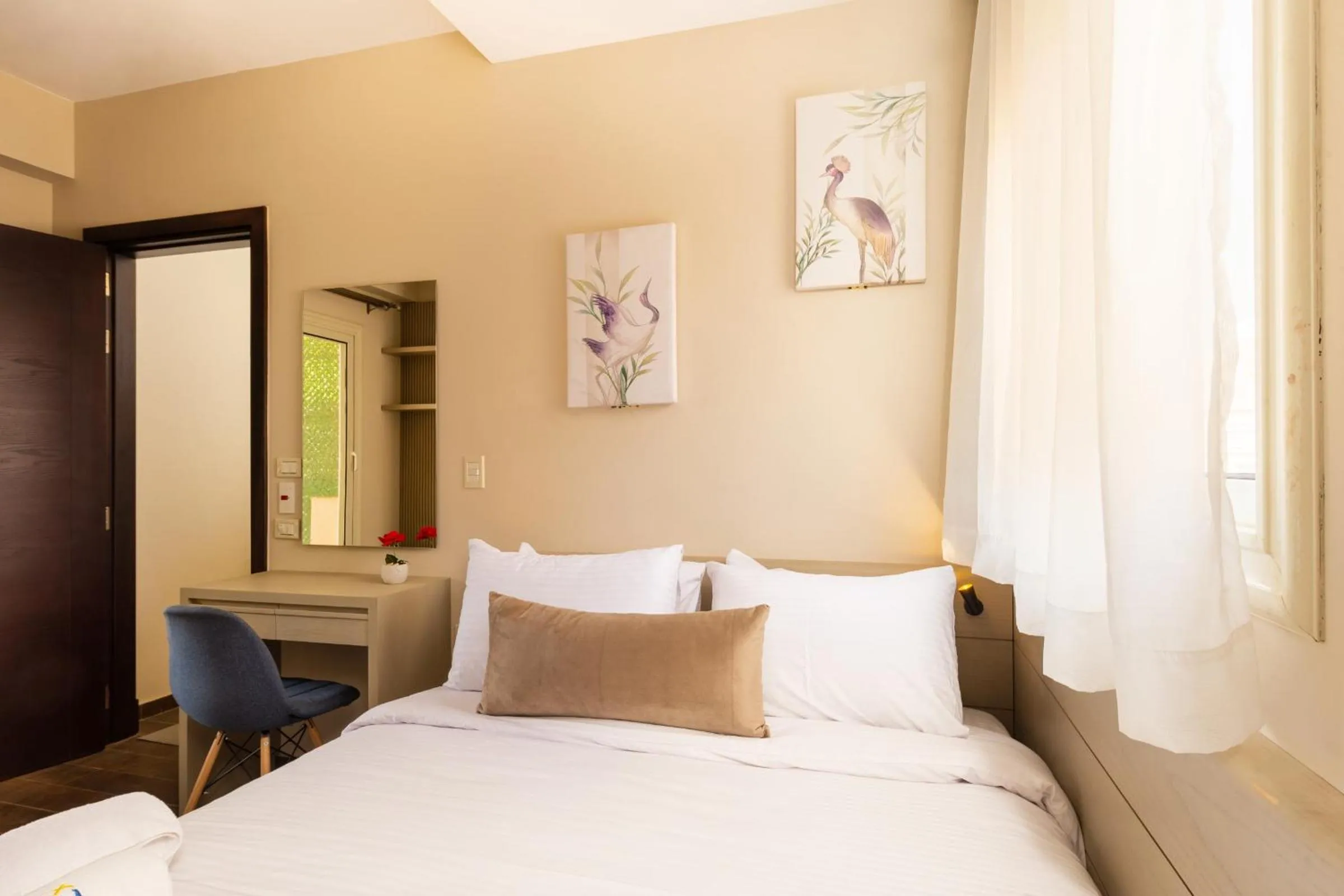 Bed in The Serene Suite A Rooftop Studio New Cairo