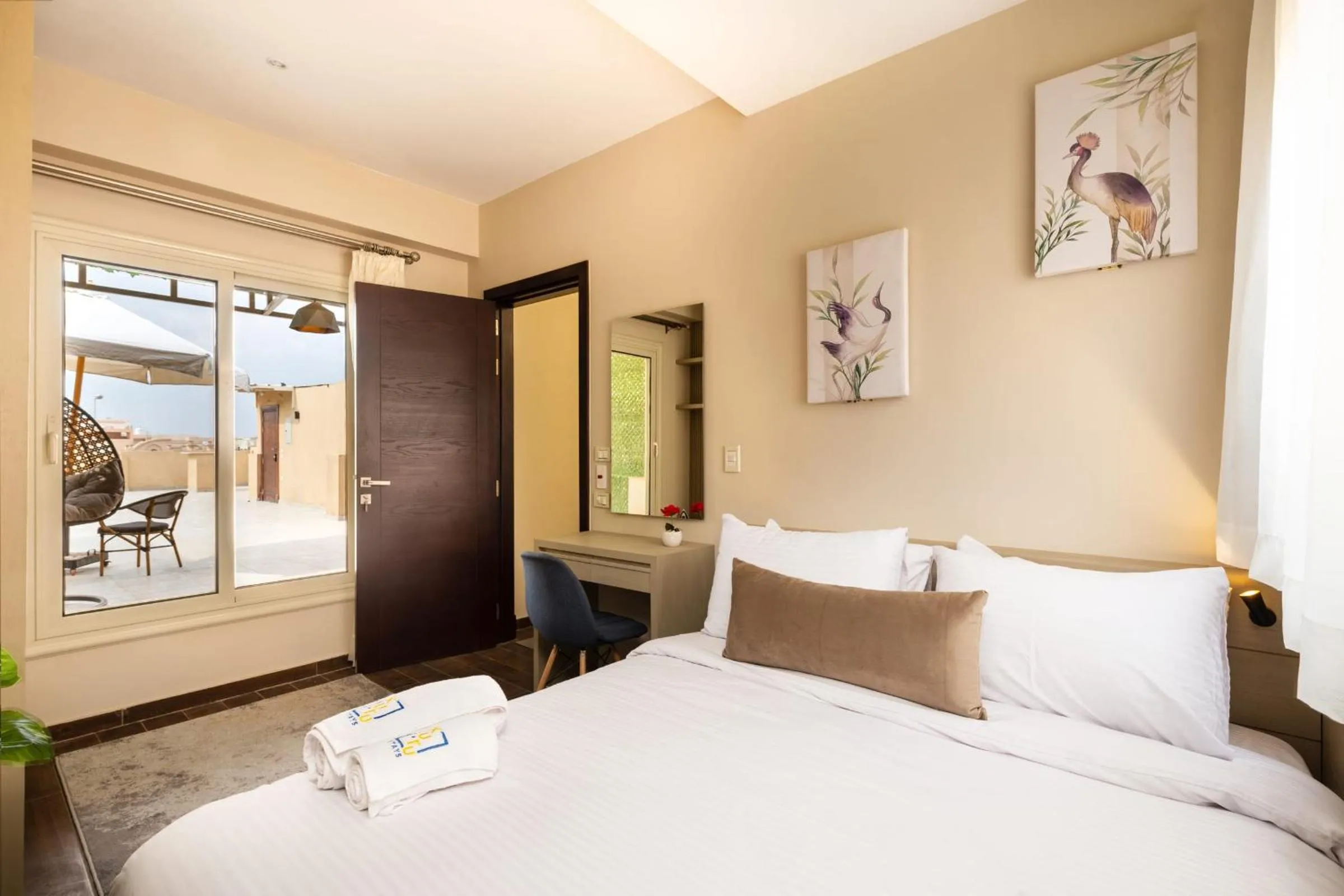 Bed in The Serene Suite A Rooftop Studio New Cairo