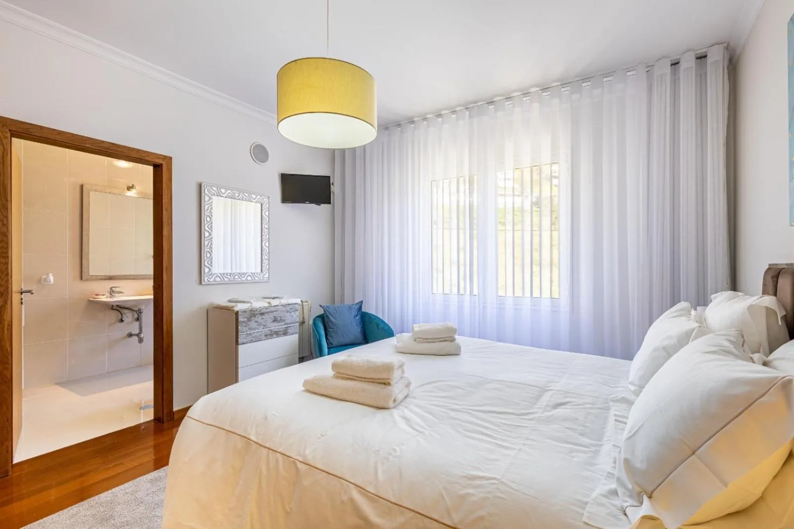 Bed in Luxury villa with private heated pool, garden and views of the sea and mountains.