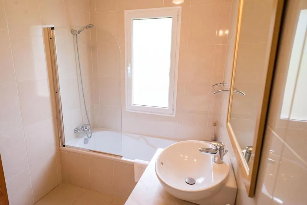 Luxury villa with private heated pool, garden and views of the sea and mountains.