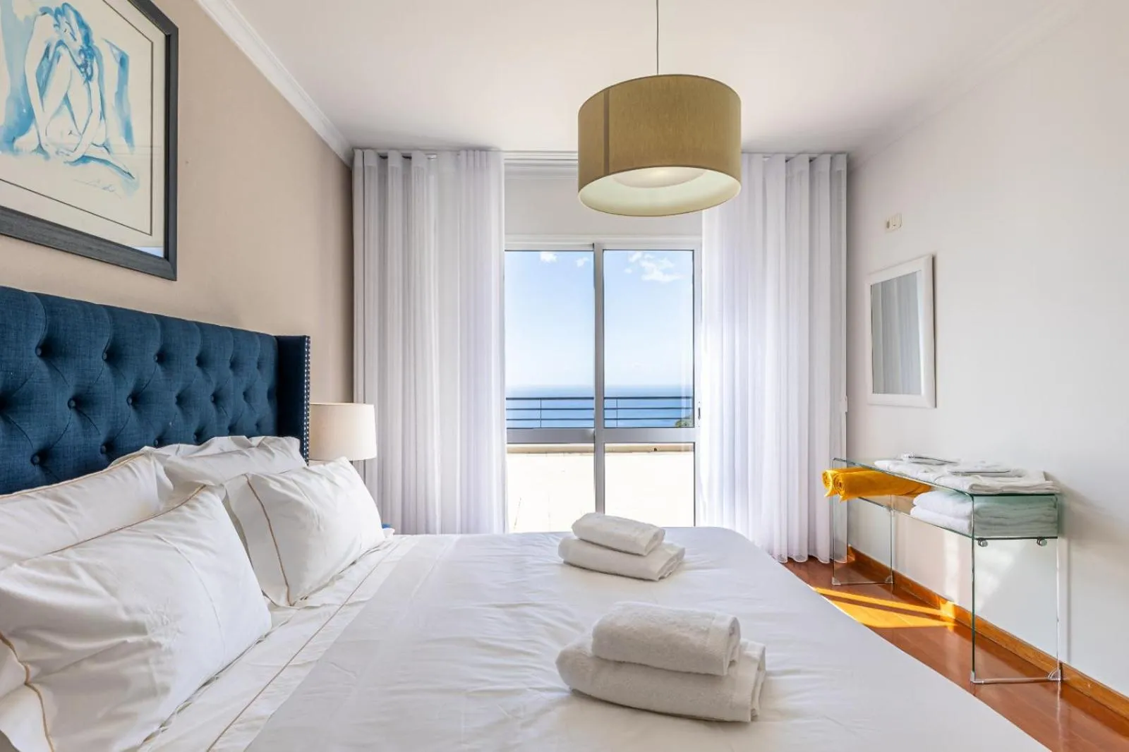 Bed in Luxury villa with private heated pool, garden and views of the sea and mountains.