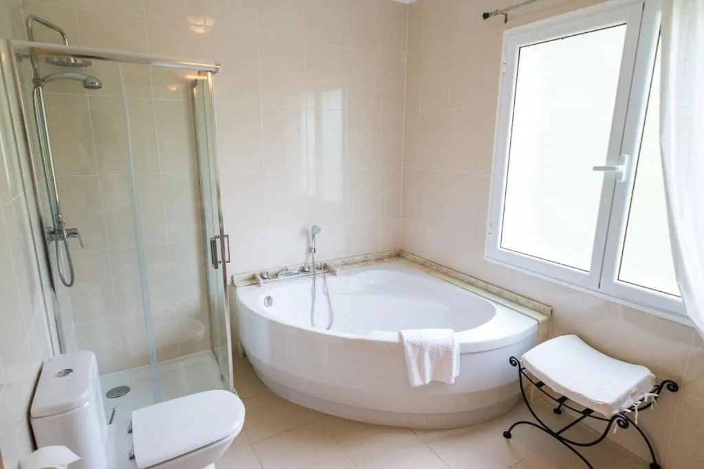Luxury villa with private heated pool, garden and views of the sea and mountains.