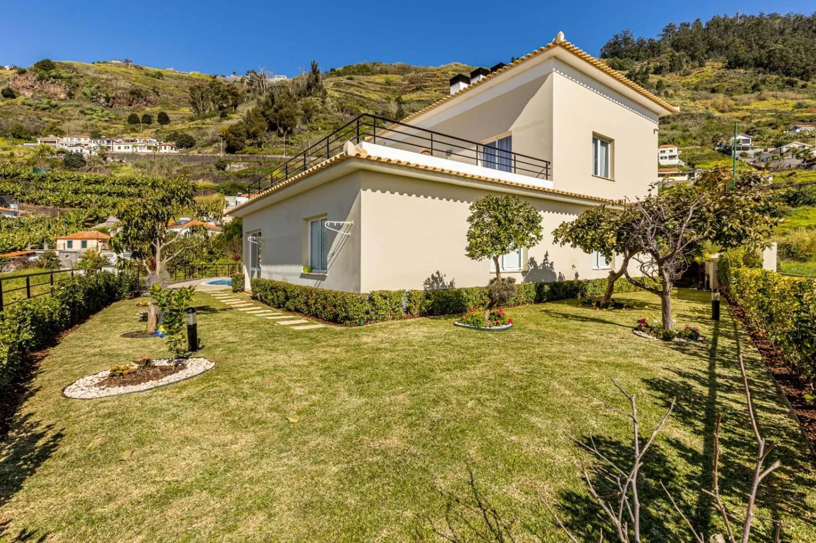Luxury villa with private heated pool, garden and views of the sea and mountains.