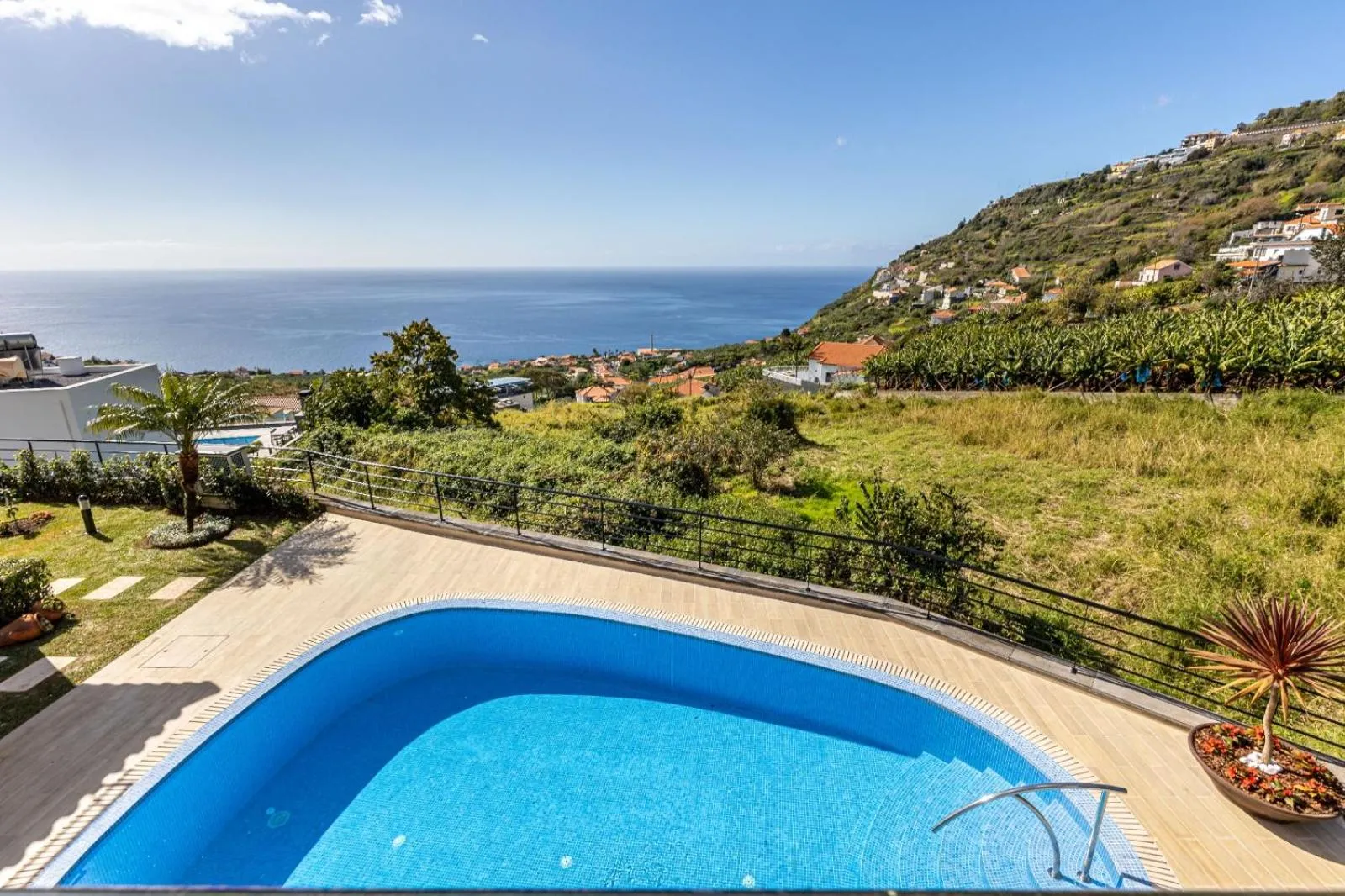 Luxury villa with private heated pool, garden and views of the sea and mountains.