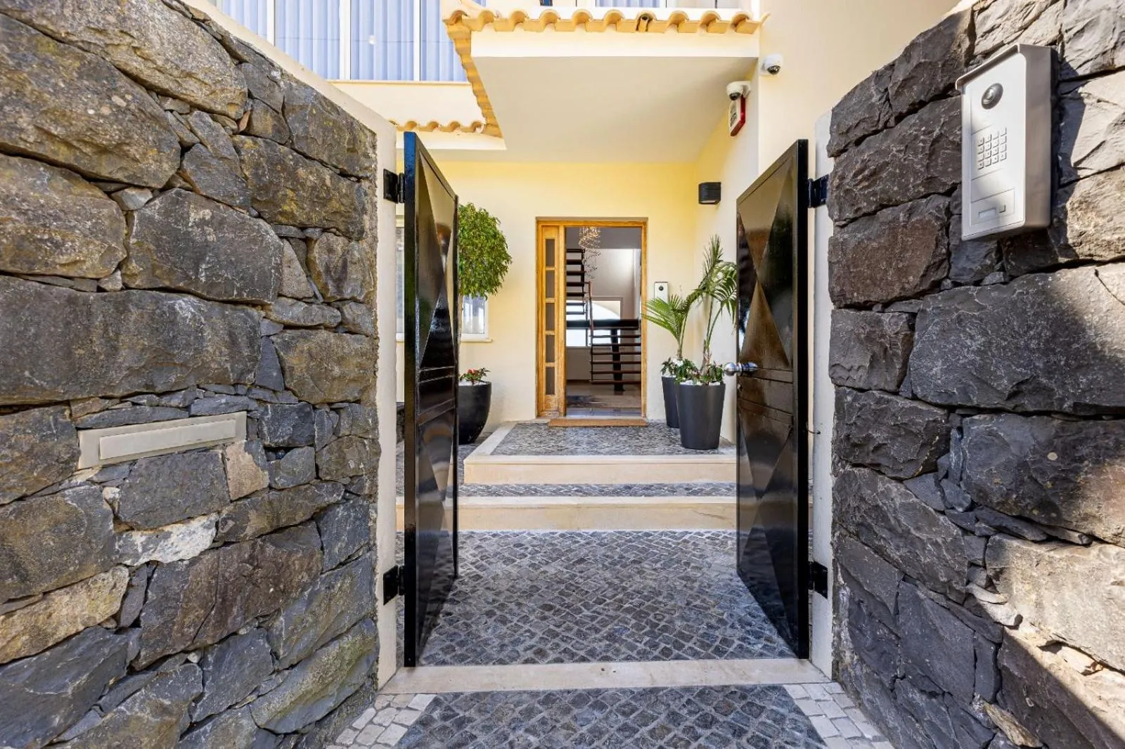 Luxury villa with private heated pool, garden and views of the sea and mountains.