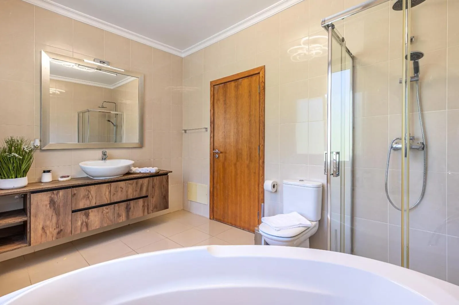 Bathroom in Luxury villa with private heated pool, garden and views of the sea and mountains.