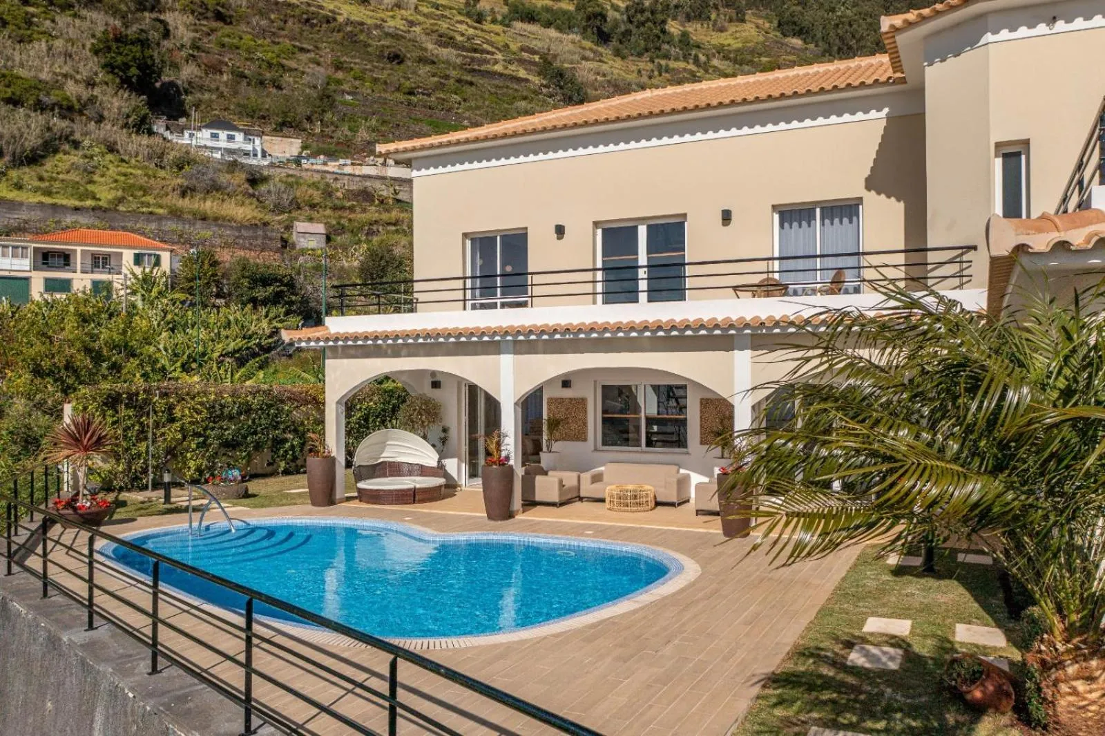Luxury villa with private heated pool, garden and views of the sea and mountains.