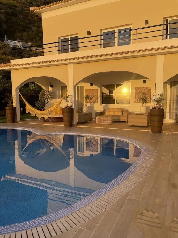Balcony/Terrace in Luxury villa with private heated pool, garden and views of the sea and mountains.