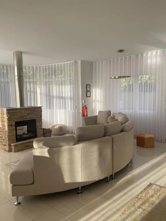 Luxury villa with private heated pool, garden and views of the sea and mountains.