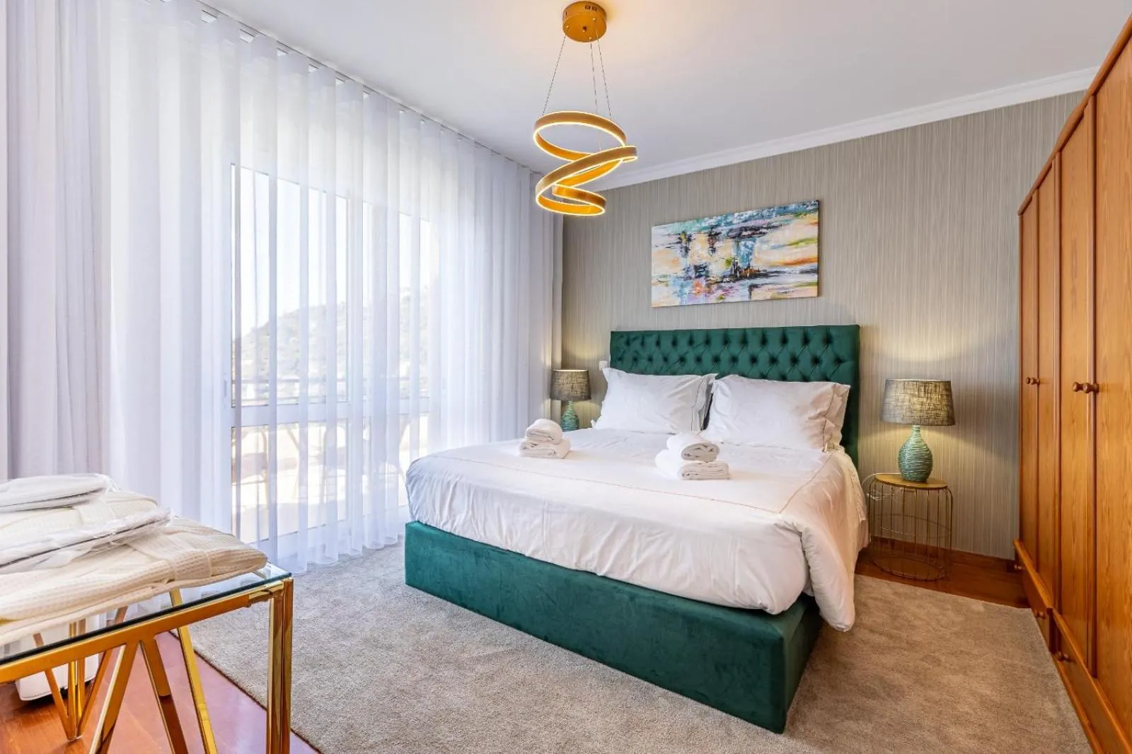 Bed in Luxury villa with private heated pool, garden and views of the sea and mountains.