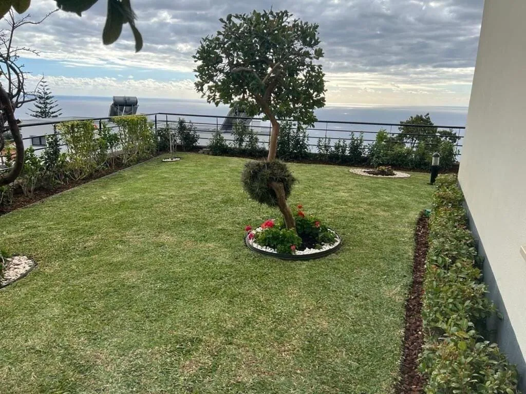 Garden in Luxury villa with private heated pool, garden and views of the sea and mountains.