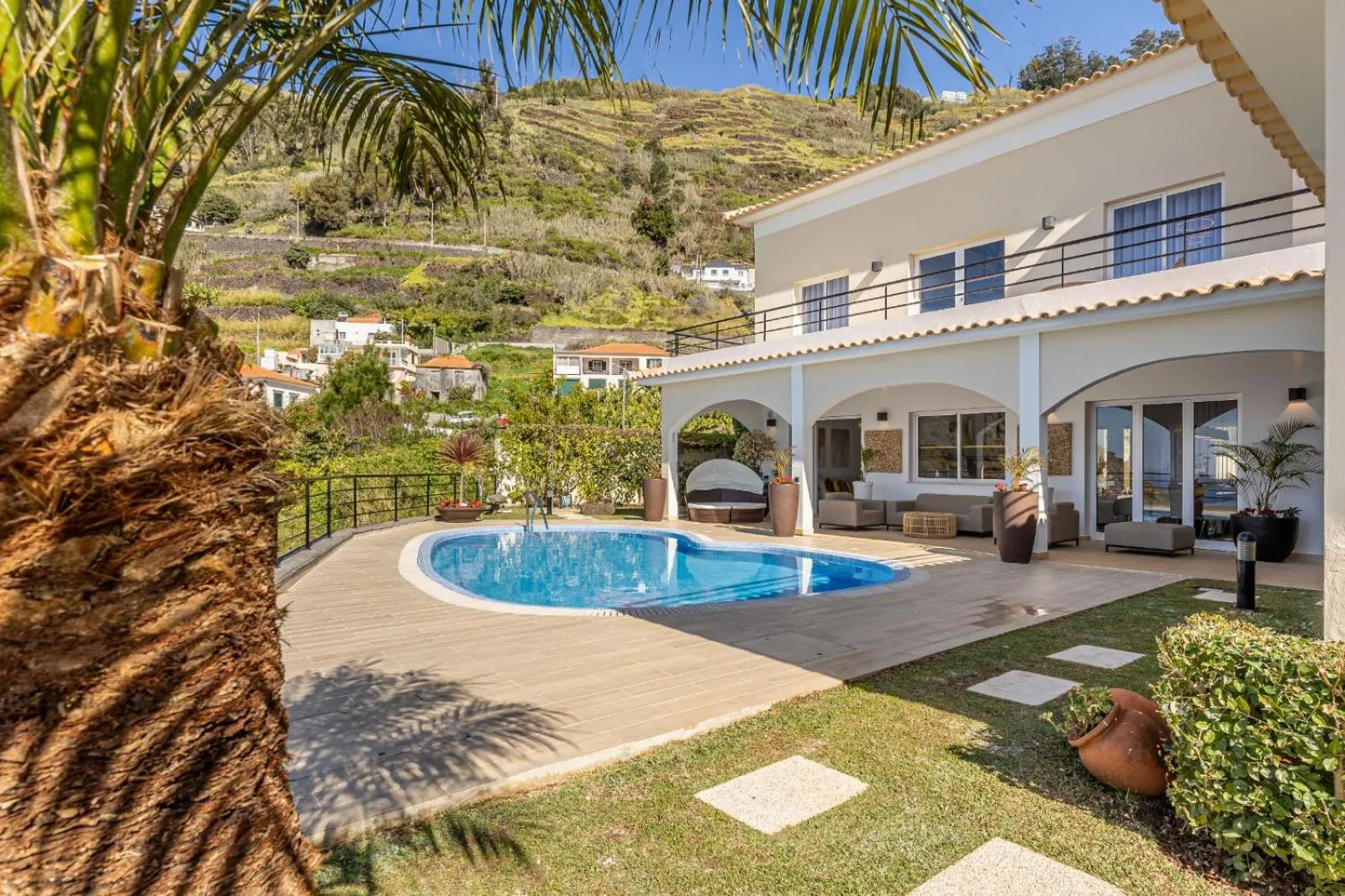 Swimming pool in Luxury villa with private heated pool, garden and views of the sea and mountains.