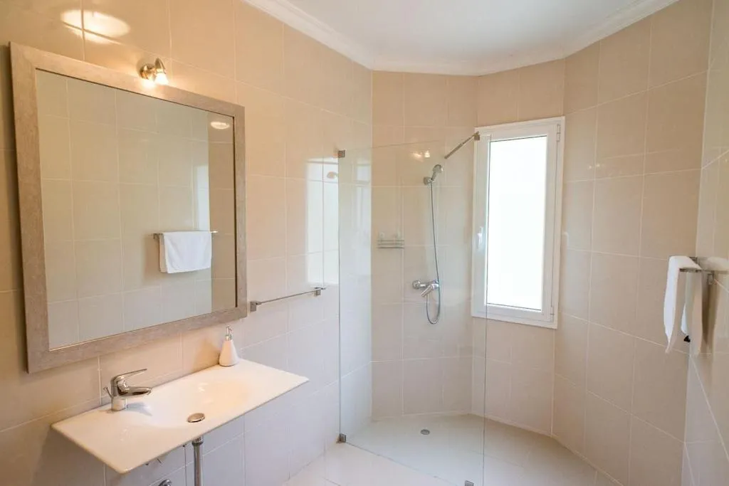 Luxury villa with private heated pool, garden and views of the sea and mountains.