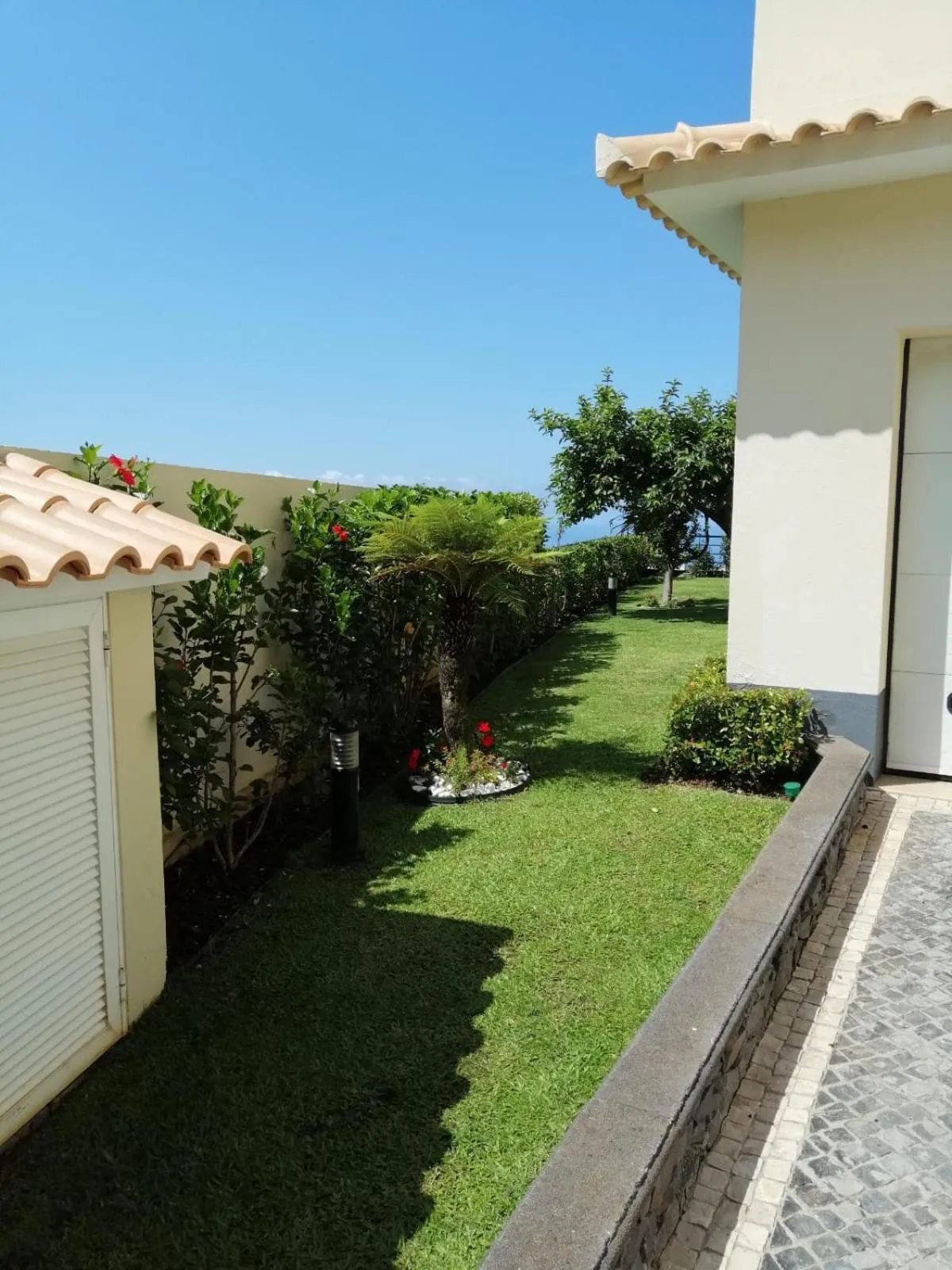 Garden in Luxury villa with private heated pool, garden and views of the sea and mountains.
