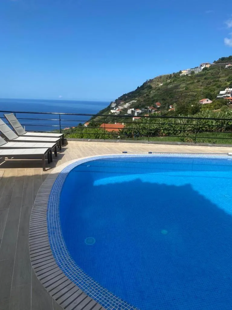 Luxury villa with private heated pool, garden and views of the sea and mountains.