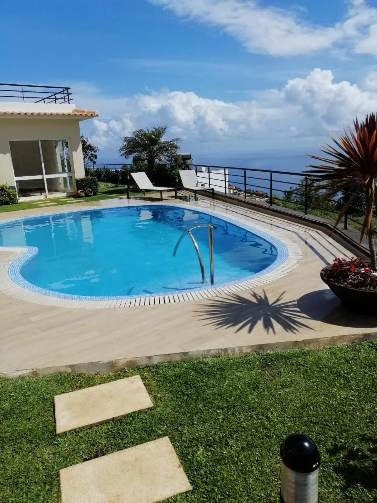 Luxury villa with private heated pool, garden and views of the sea and mountains.