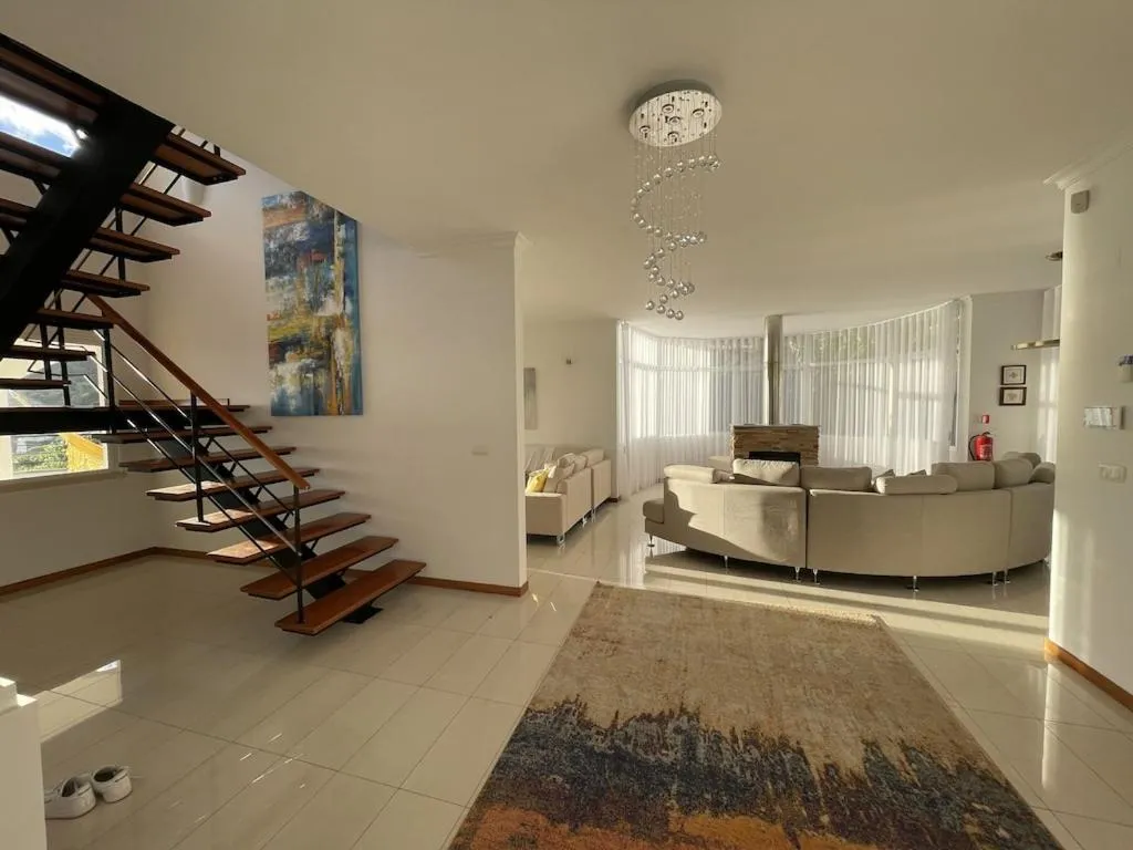 Luxury villa with private heated pool, garden and views of the sea and mountains.