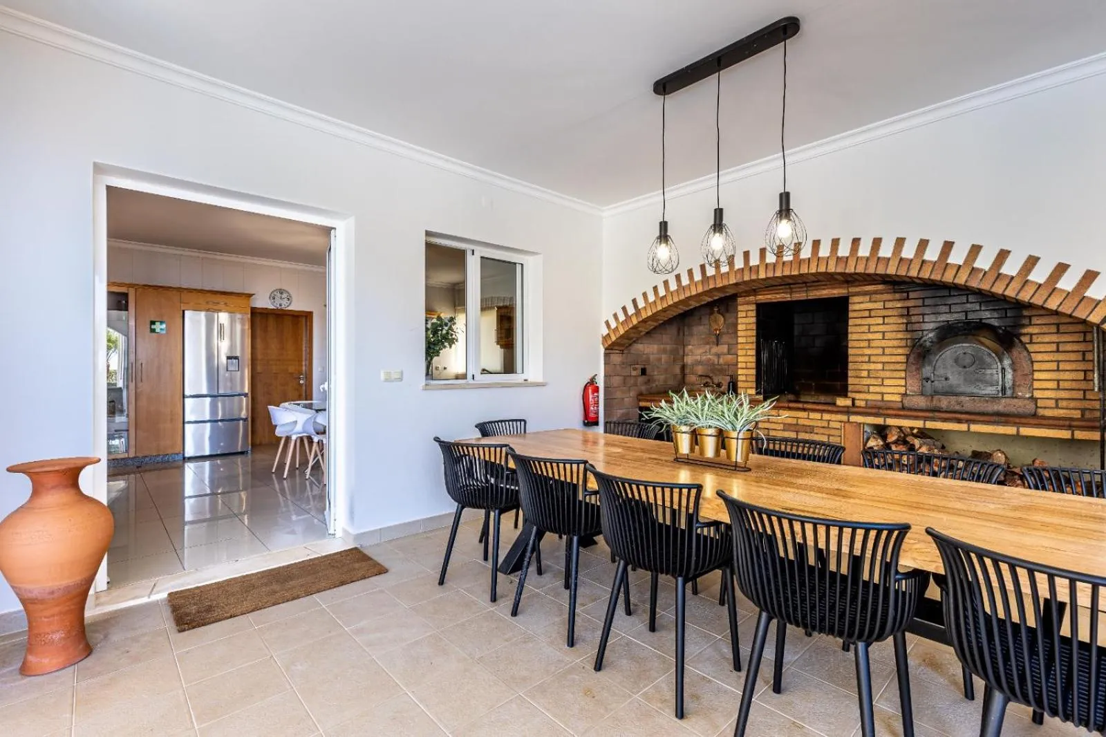 BBQ facilities in Luxury villa with private heated pool, garden and views of the sea and mountains.