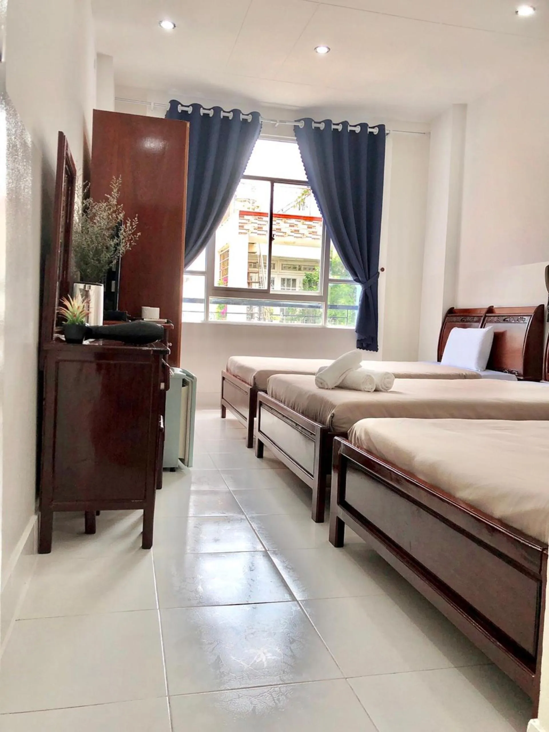 Bed in Saigon Cozy Hotel