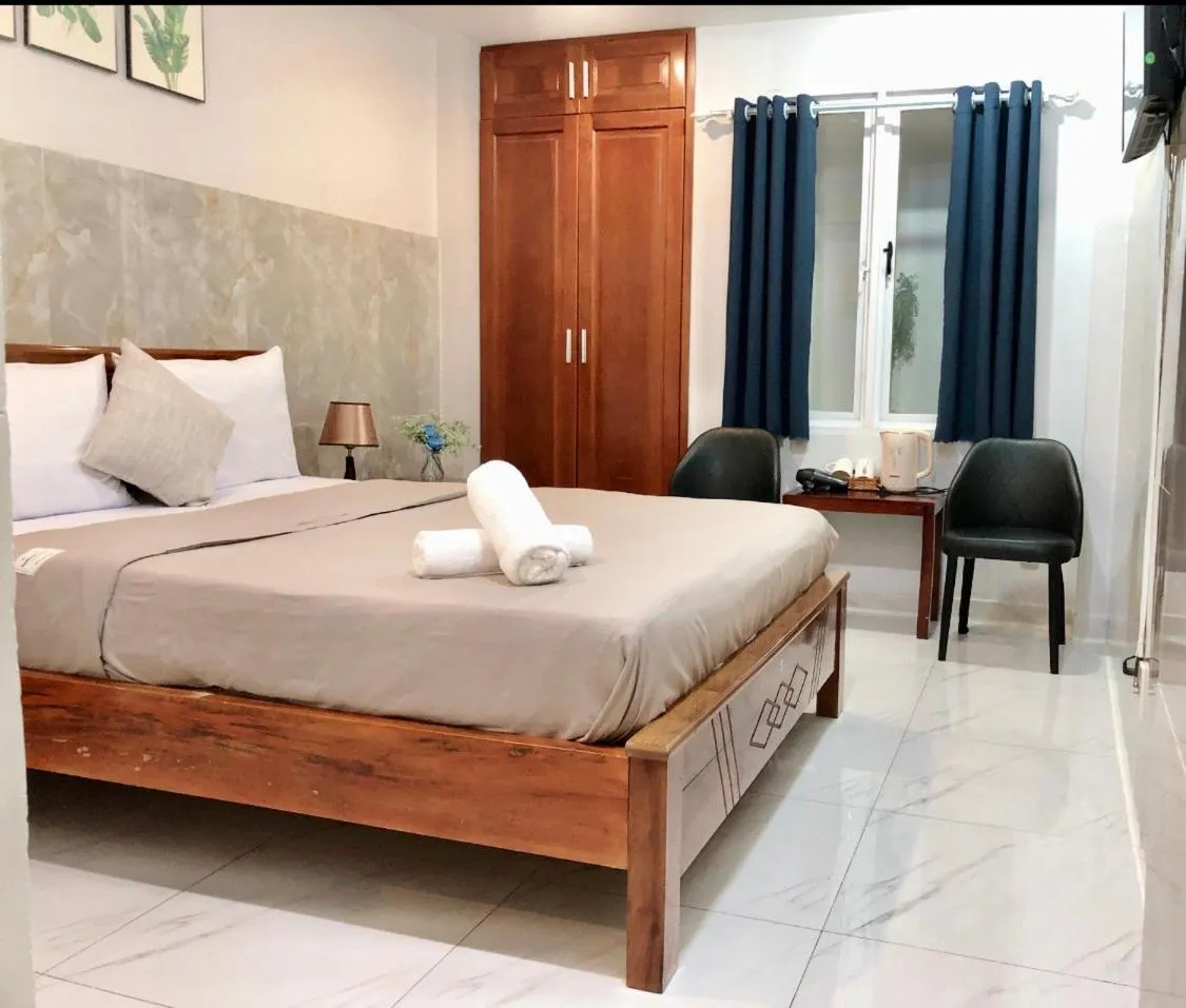 Bed in Saigon Cozy Hotel