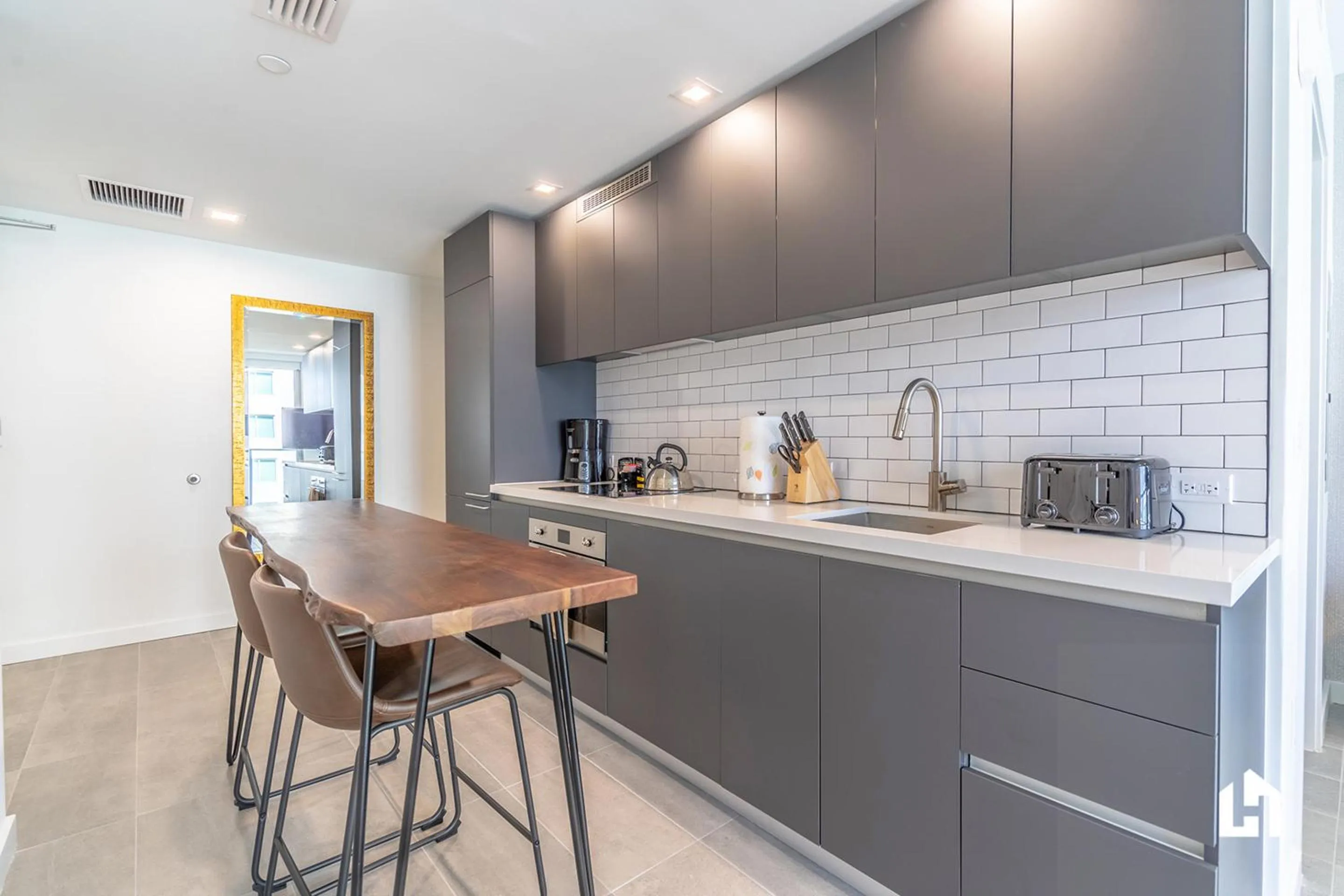 Kitchen or kitchenette in Downtown Miami Condos by Lua Host