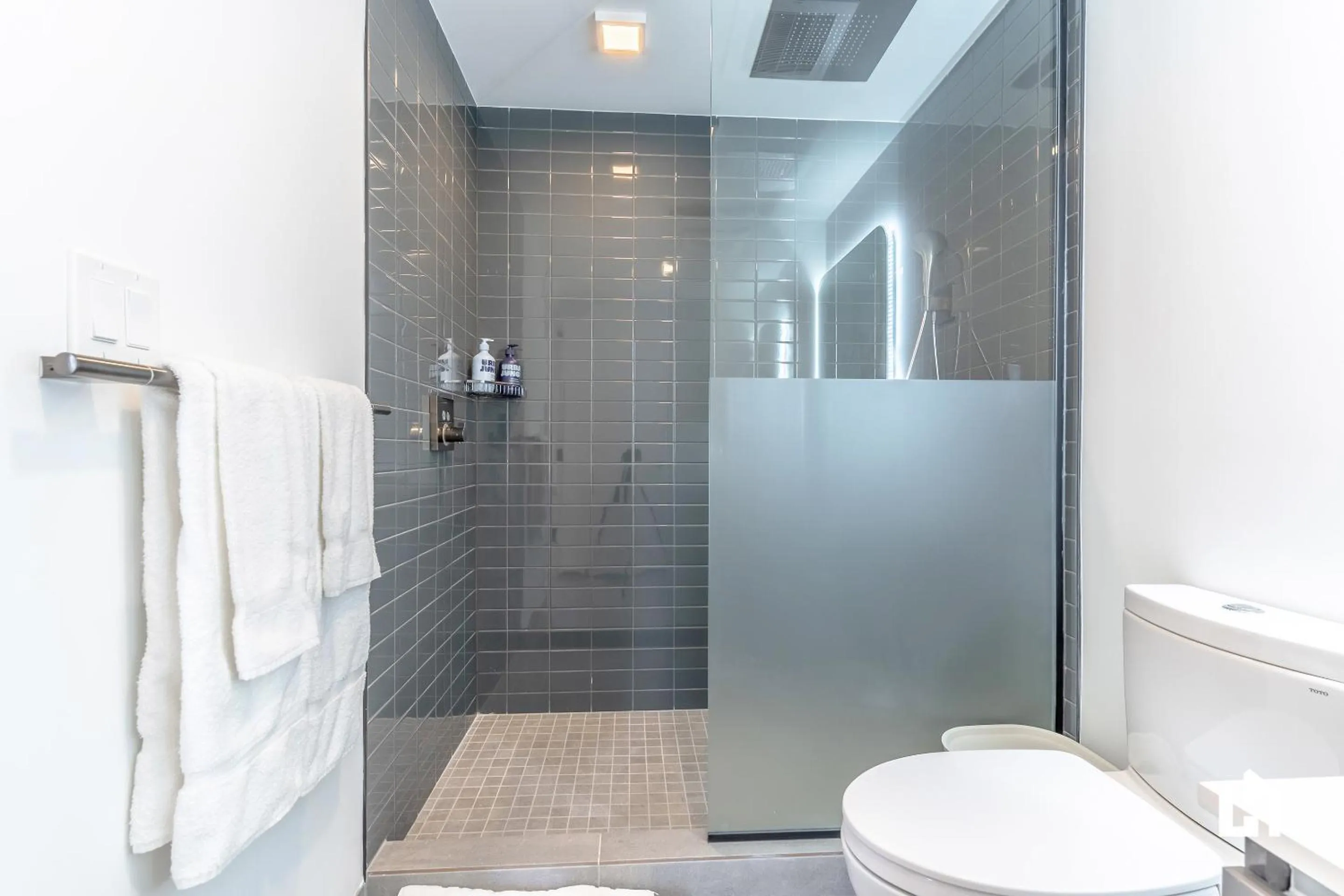 Shower in Downtown Miami Condos by Lua Host