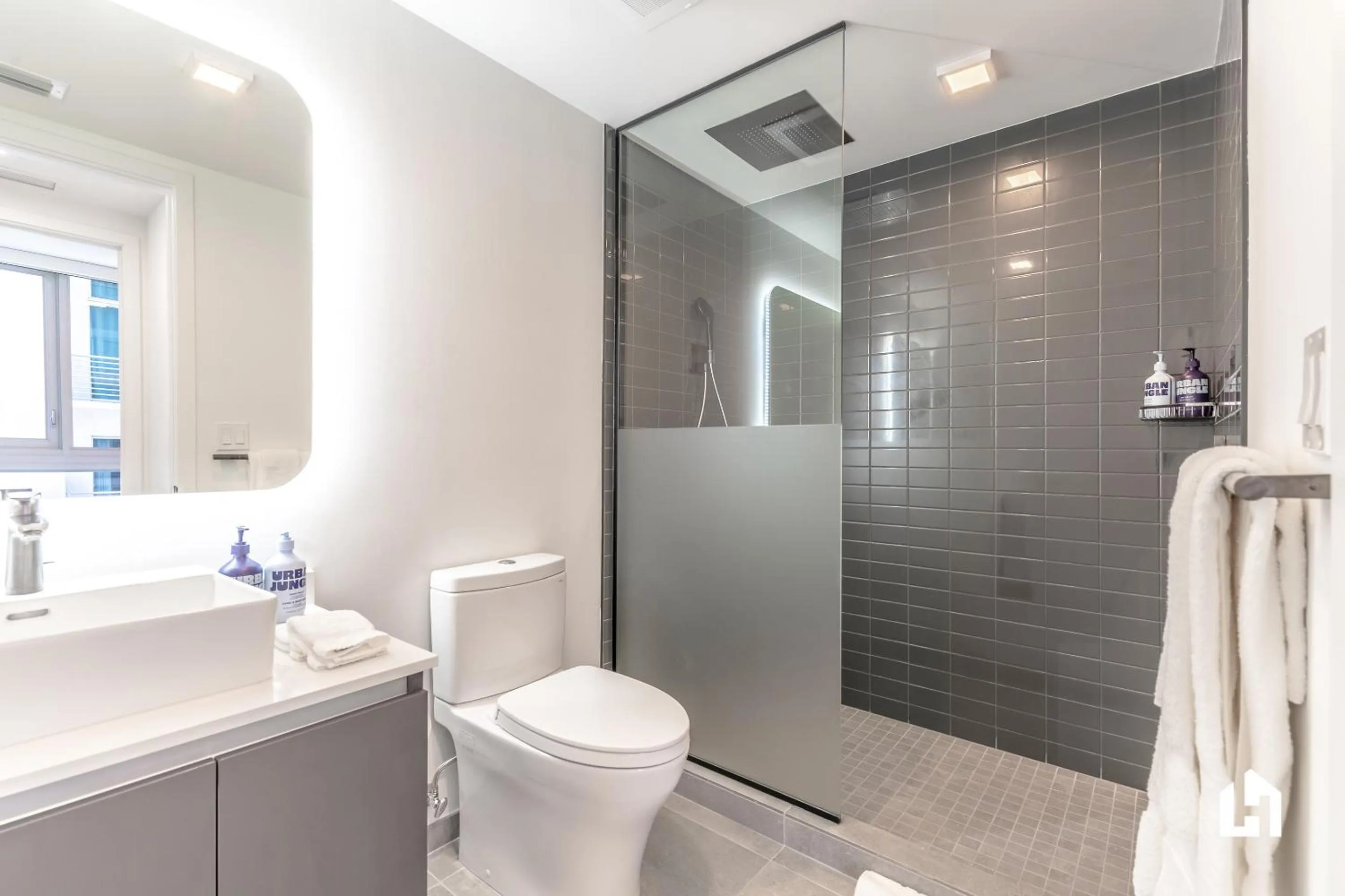 Shower in Downtown Miami Condos by Lua Host
