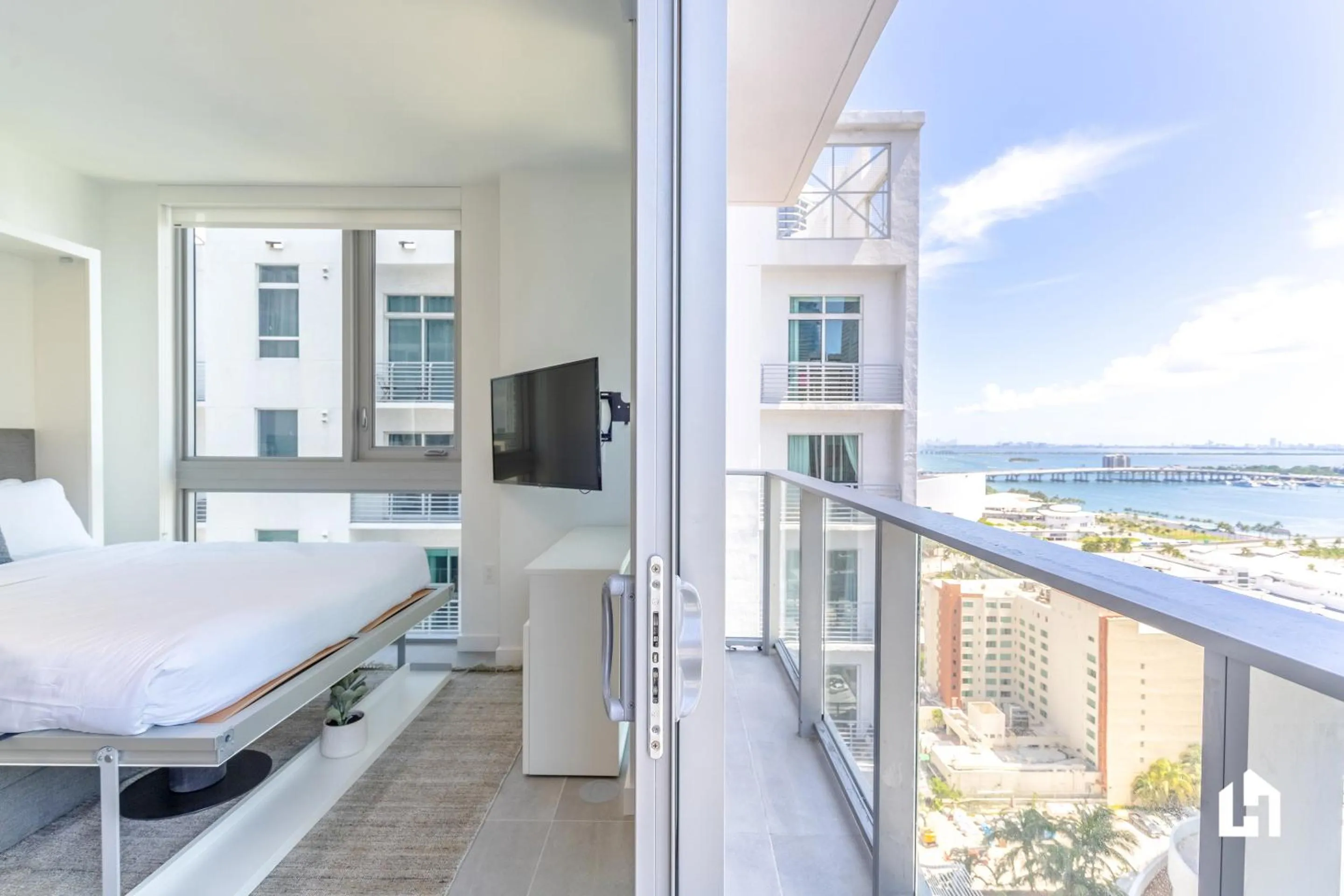 Bed in Downtown Miami Condos by Lua Host