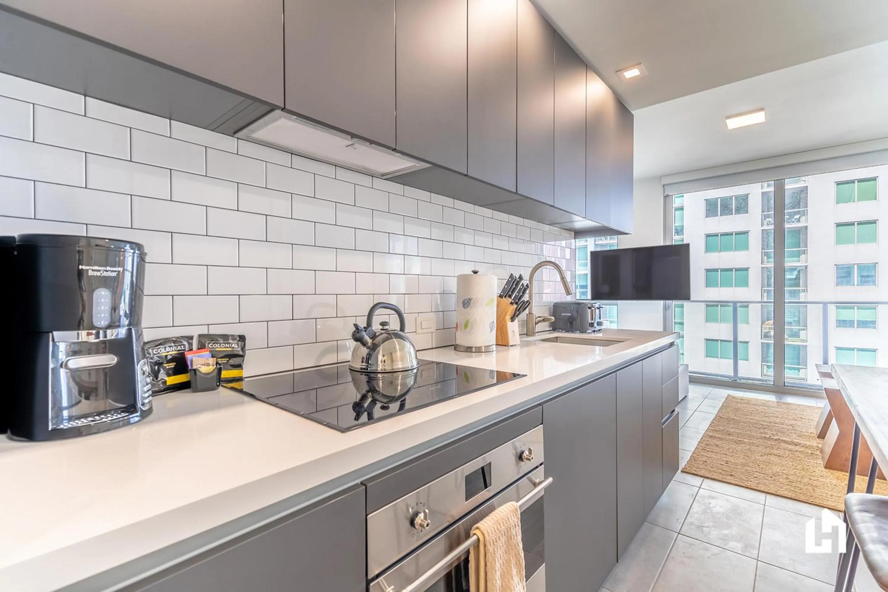 Kitchen or kitchenette in Downtown Miami Condos by Lua Host