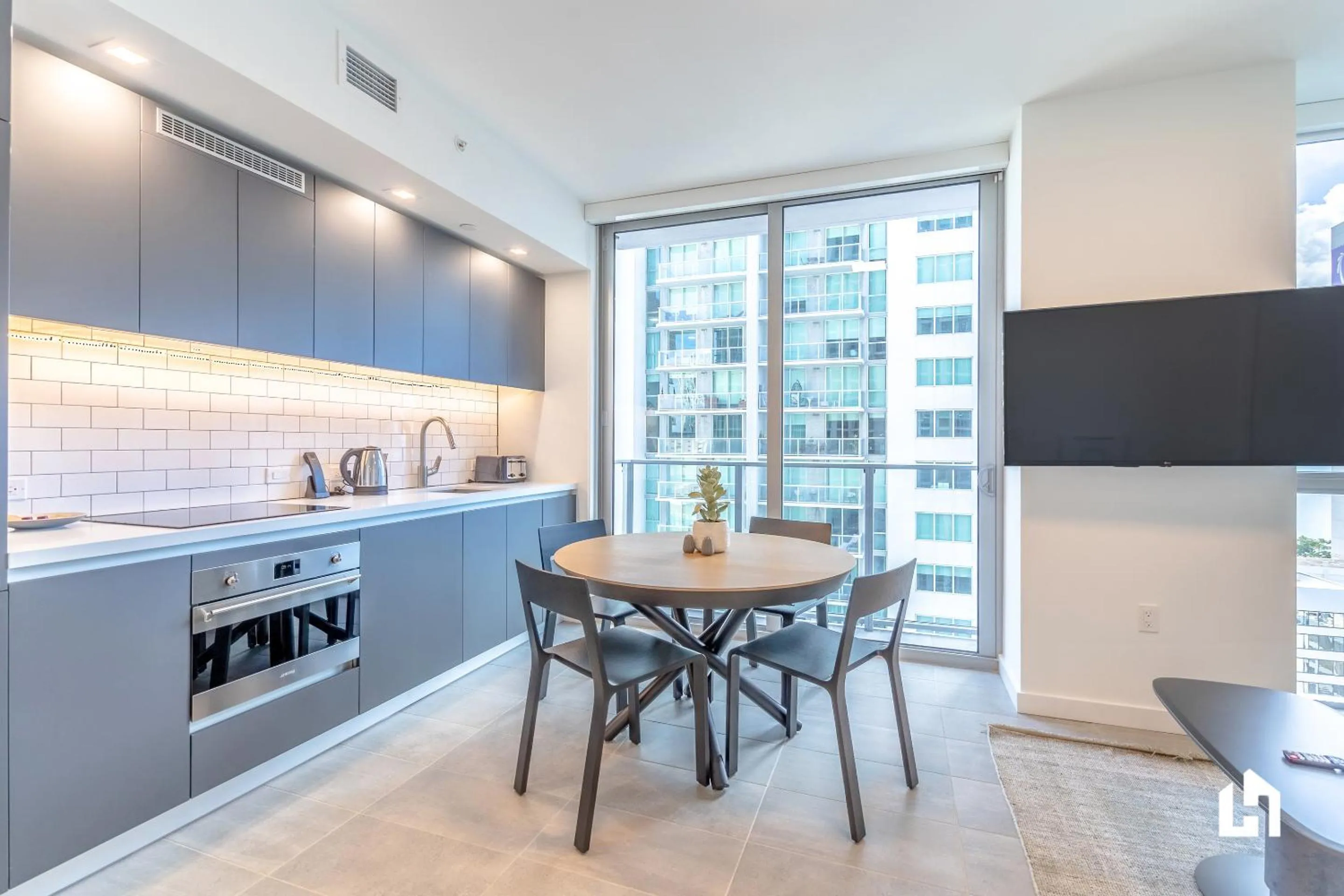 TV and multimedia in Downtown Miami Condos by Lua Host