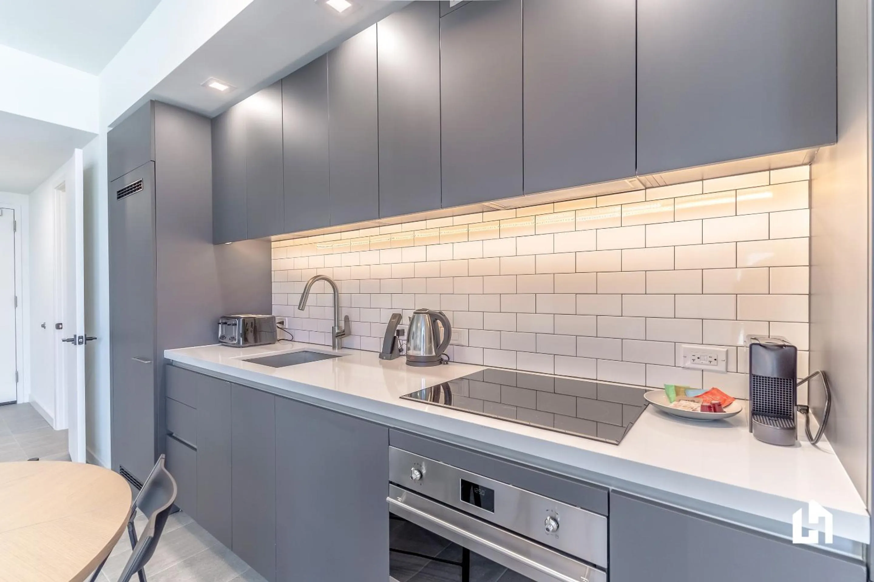 Kitchen or kitchenette in Downtown Miami Condos by Lua Host
