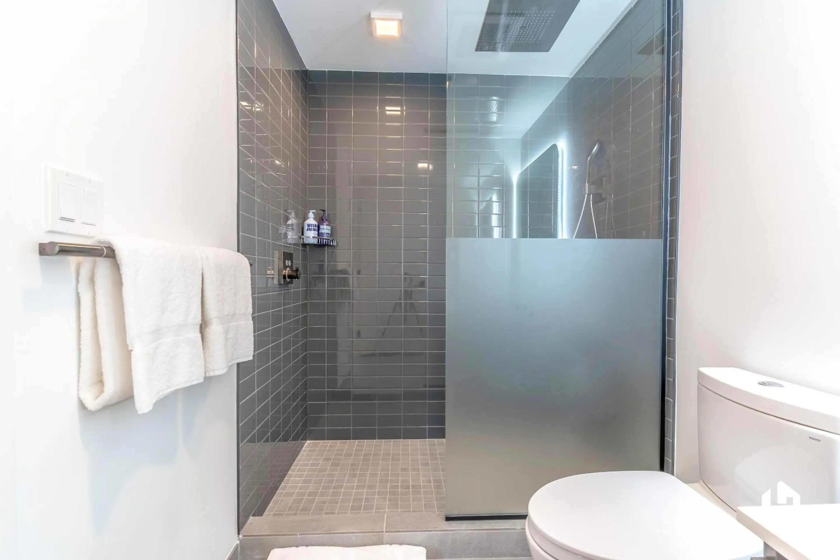 Shower in Downtown Miami Condos by Lua Host