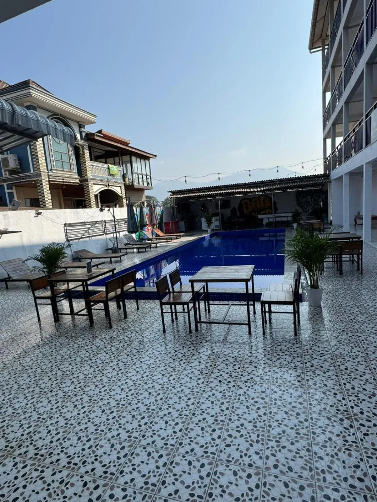 Pool view in Vang Vieng Backpackers Hostel Pool view in Vang Vieng Backpackers Hostel