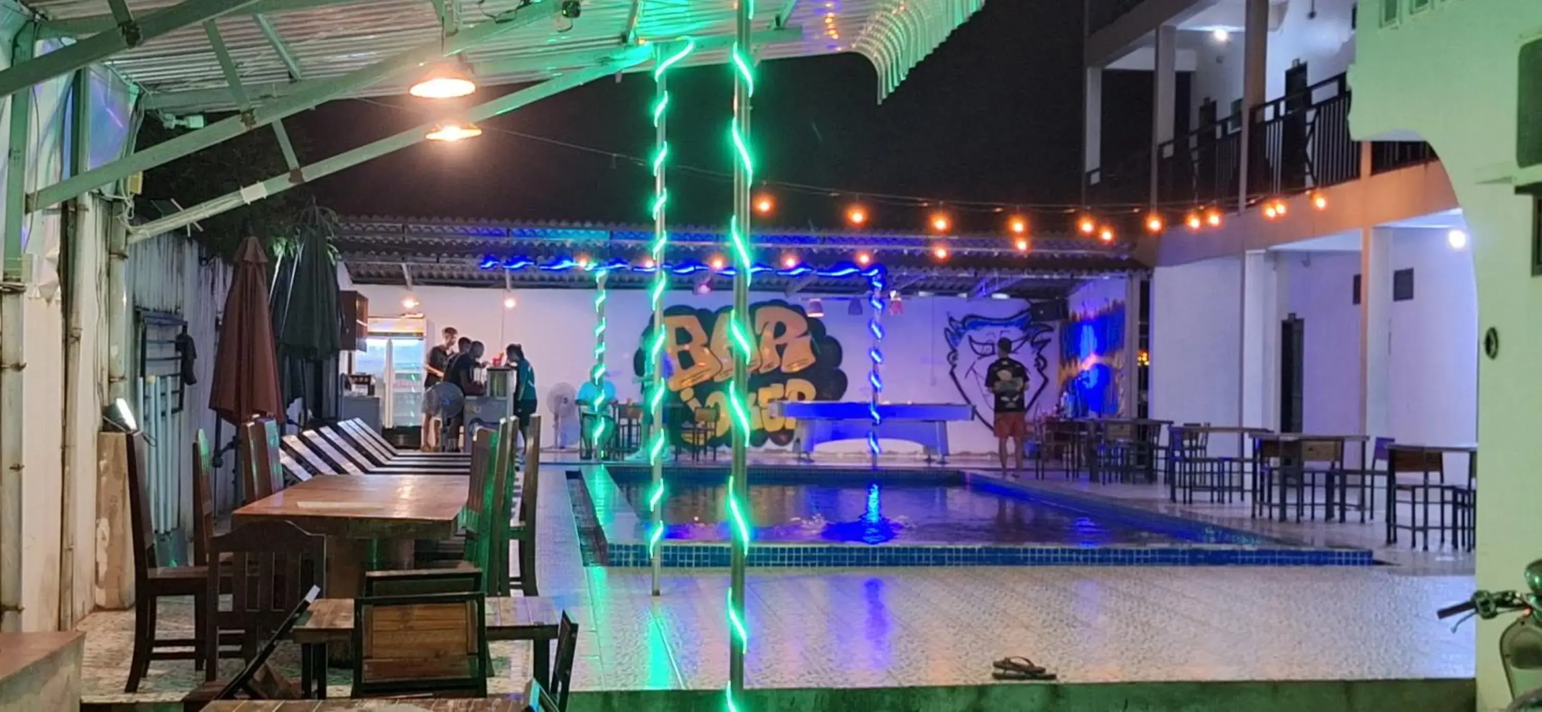 Pool view in Vang Vieng Backpackers Hostel Pool view in Vang Vieng Backpackers Hostel