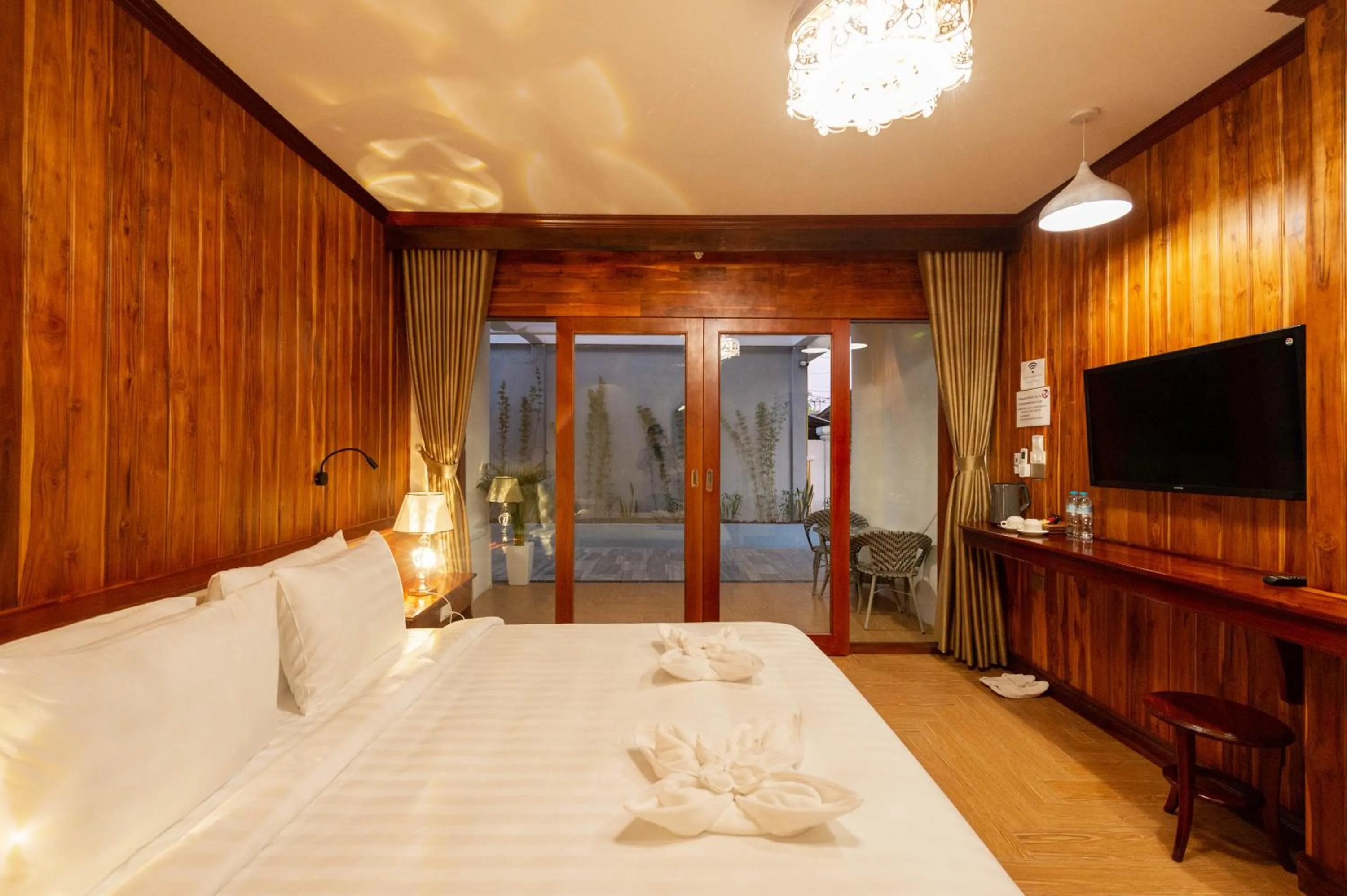 Bed in LuangPrabang Center Hotel