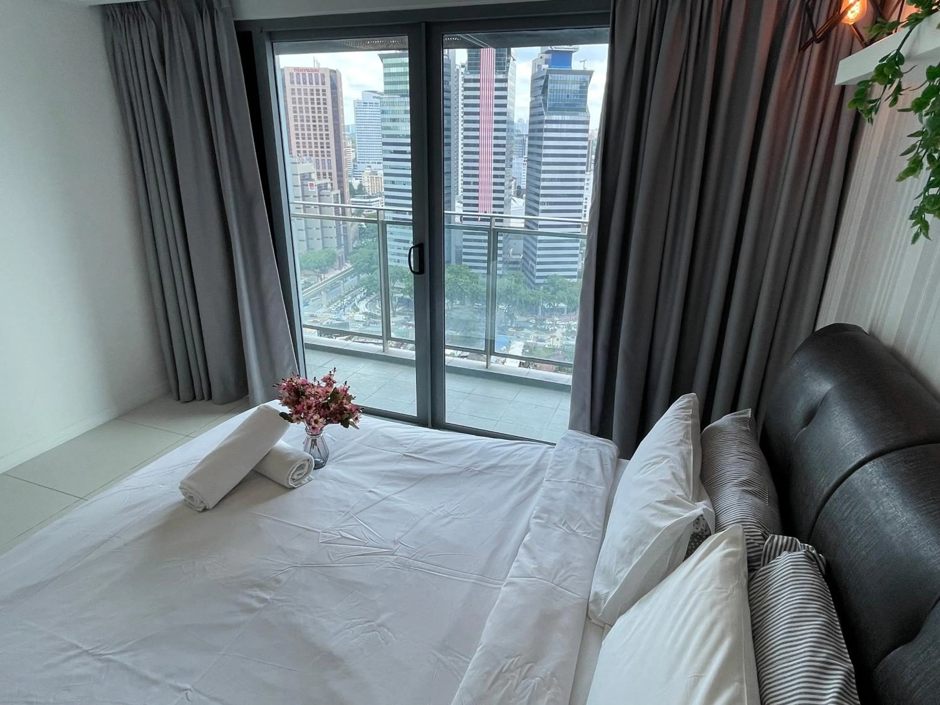 Bed in Mercu Summer Suite KLCC by Kuminshu
