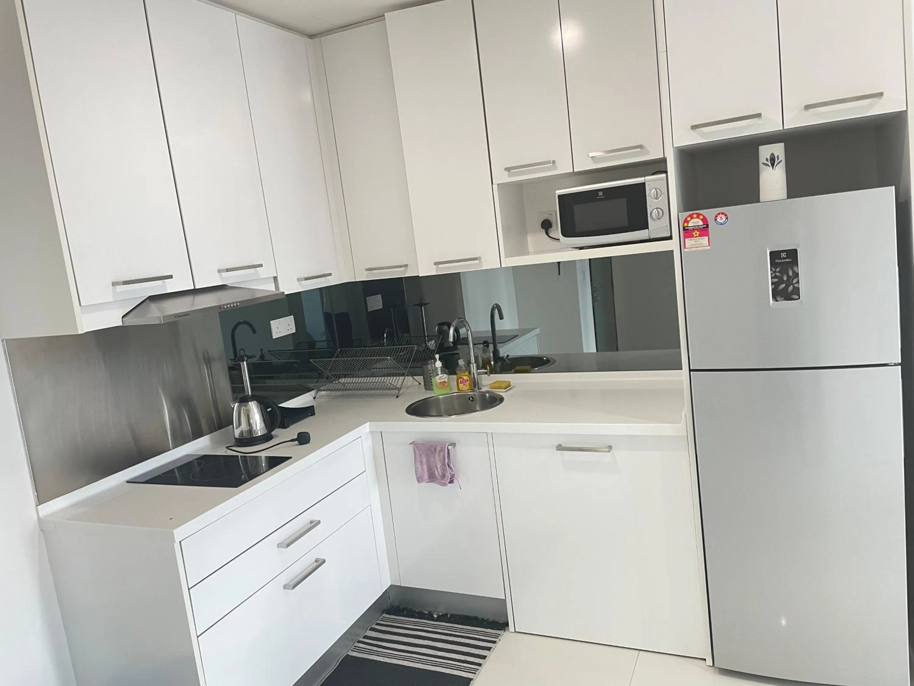 Kitchen or kitchenette in Mercu Summer Suite KLCC by Kuminshu