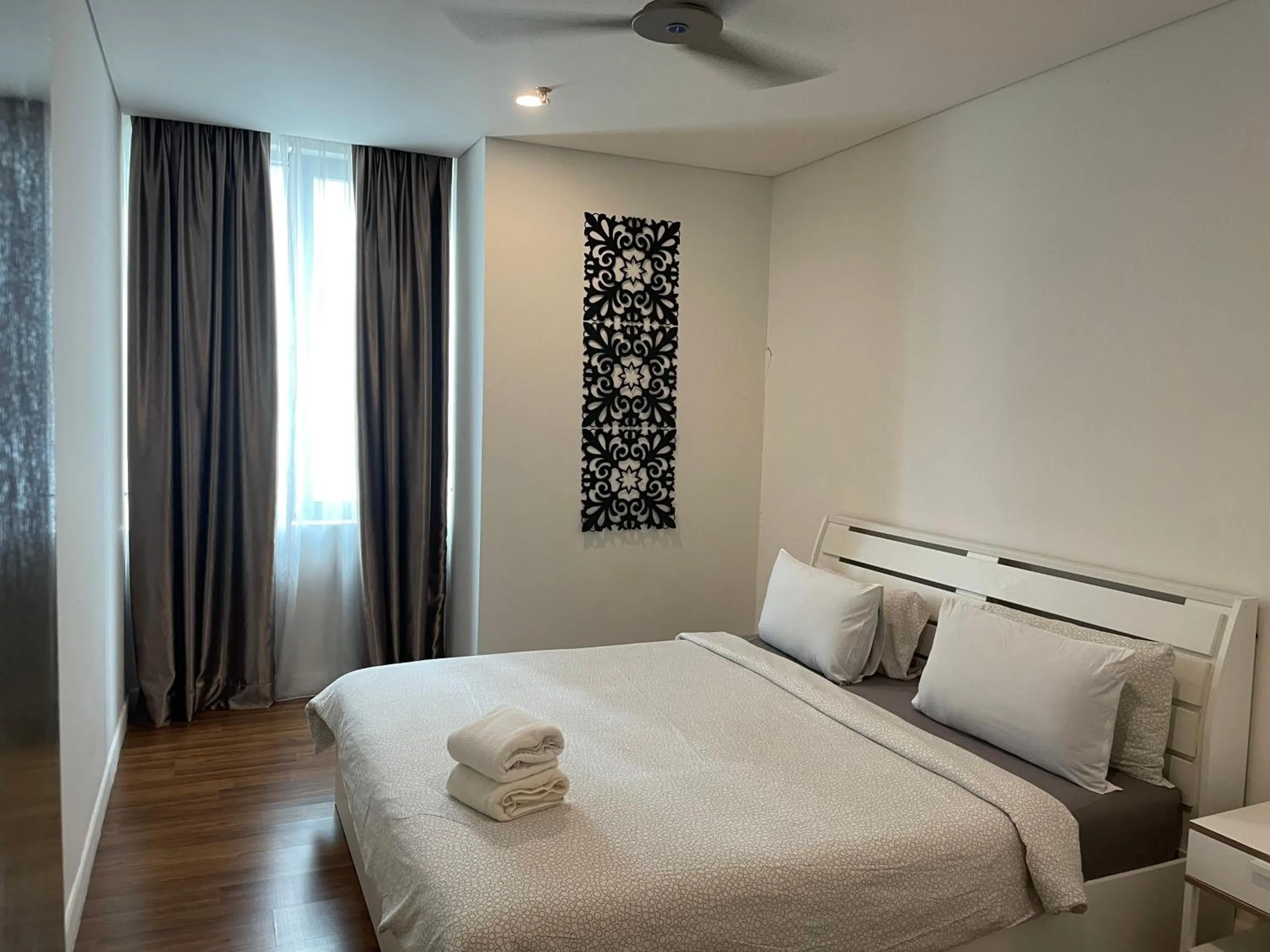 Bed in Mercu Summer Suite KLCC by Kuminshu