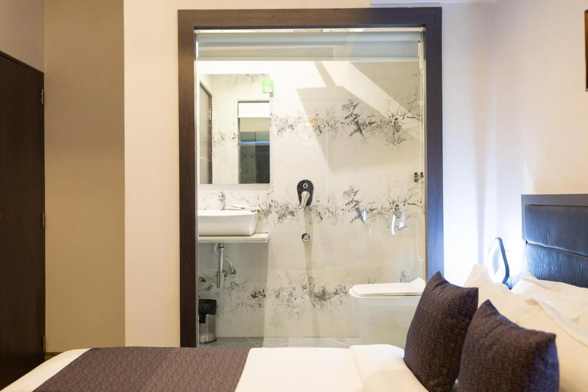 Bedroom in Hotel Larmont Luxury