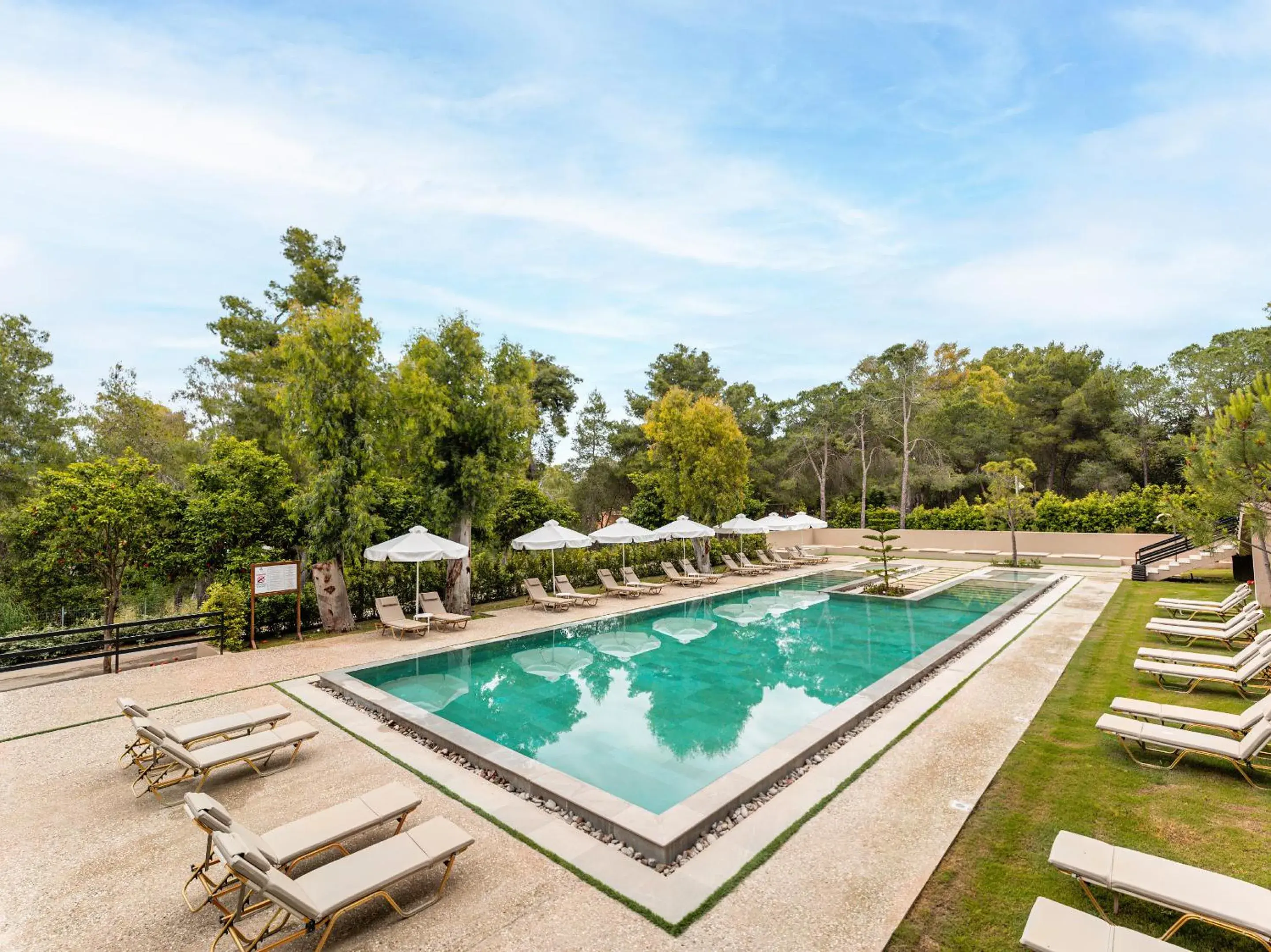 Swimming pool in Grecotel LUXME Palms at Riviera Olympia & Aqua Park Swimming pool in Grecotel LUXME Palms at Riviera Olympia & Aqua Park