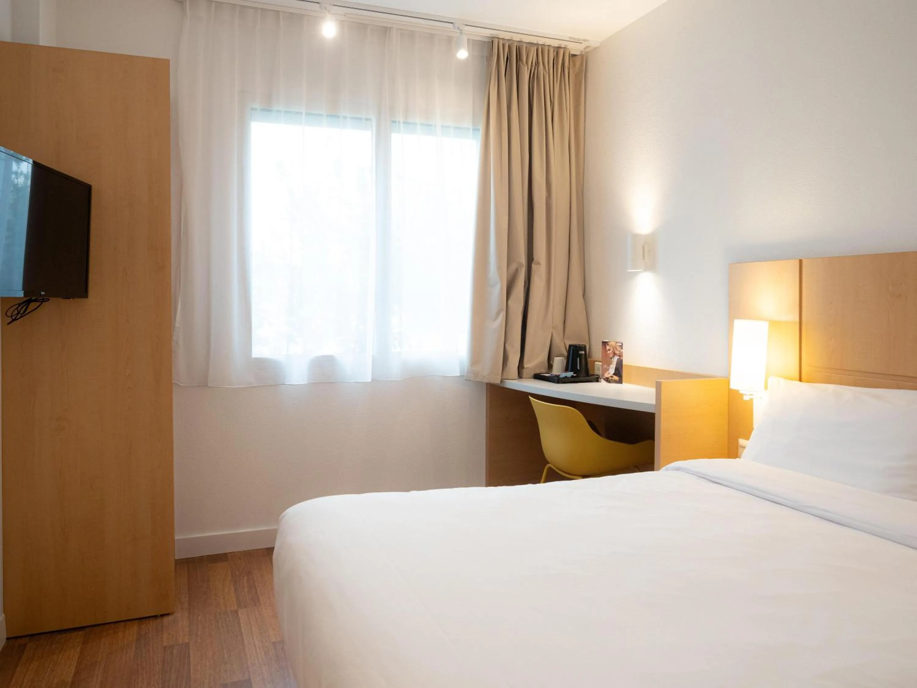 Photo of the whole room, Bed in B&B HOTEL Kielce Centrum