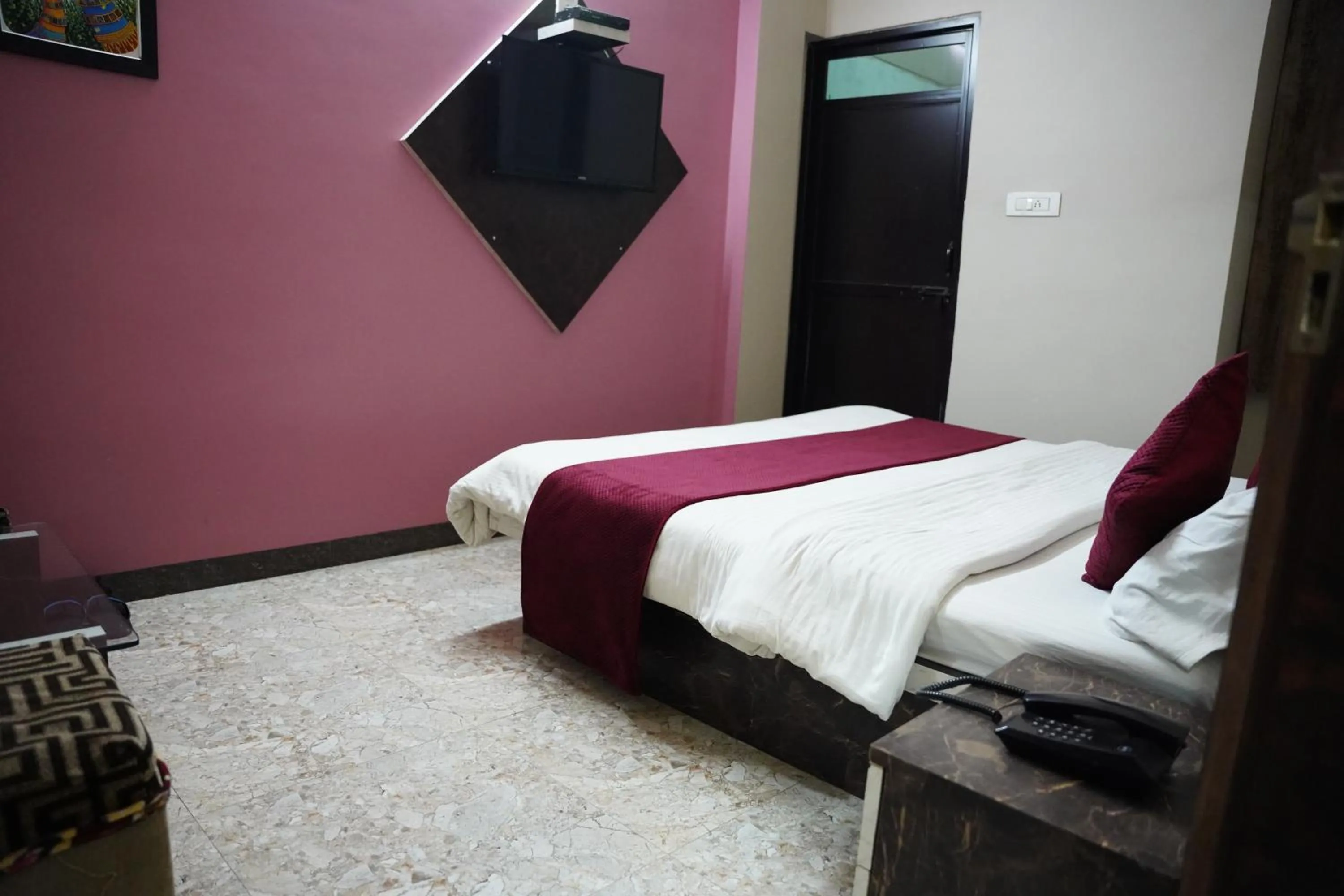 Bed in Hotel Mahishmati Palace