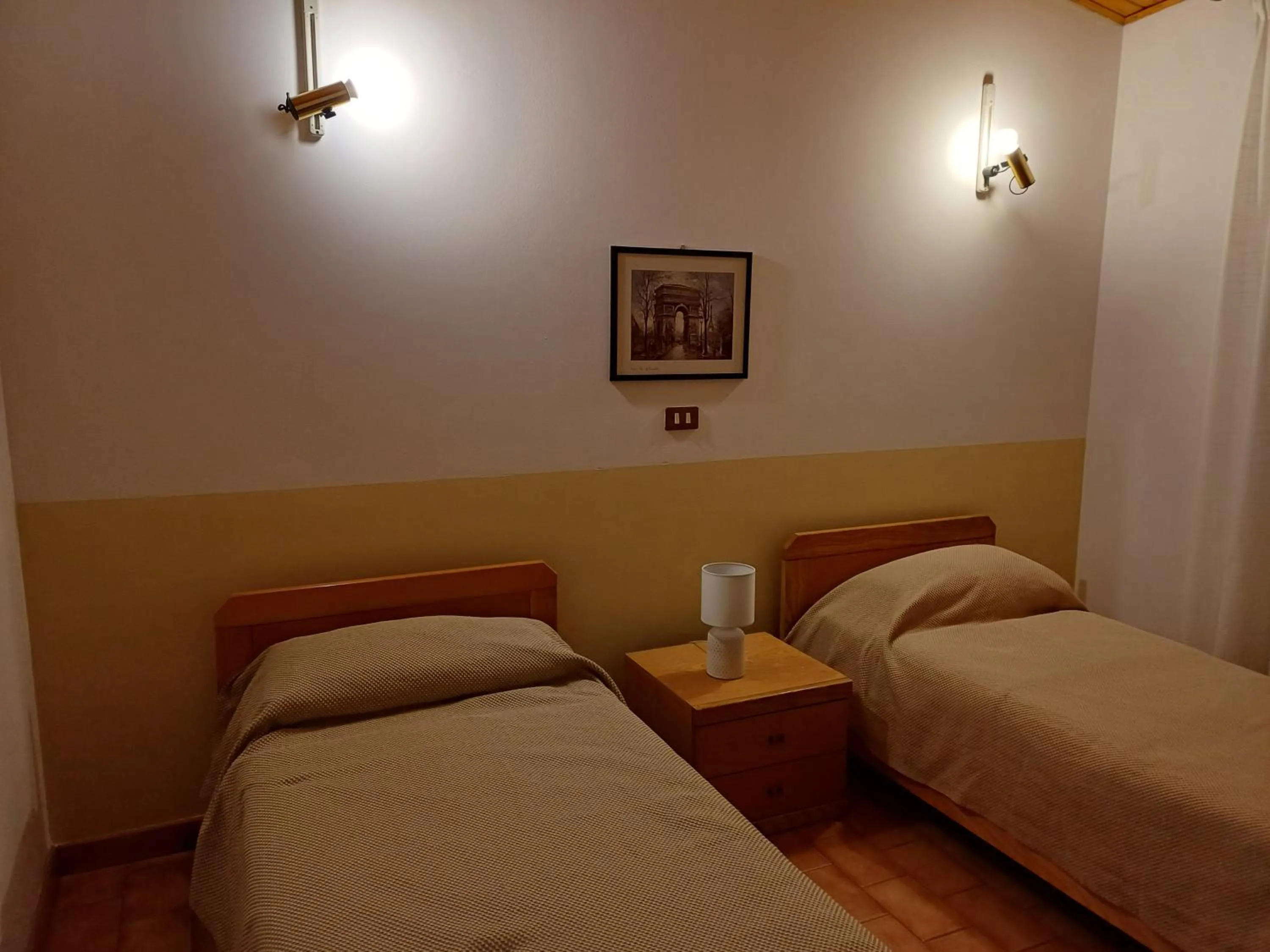 Bed in Albergo Dalla Mena