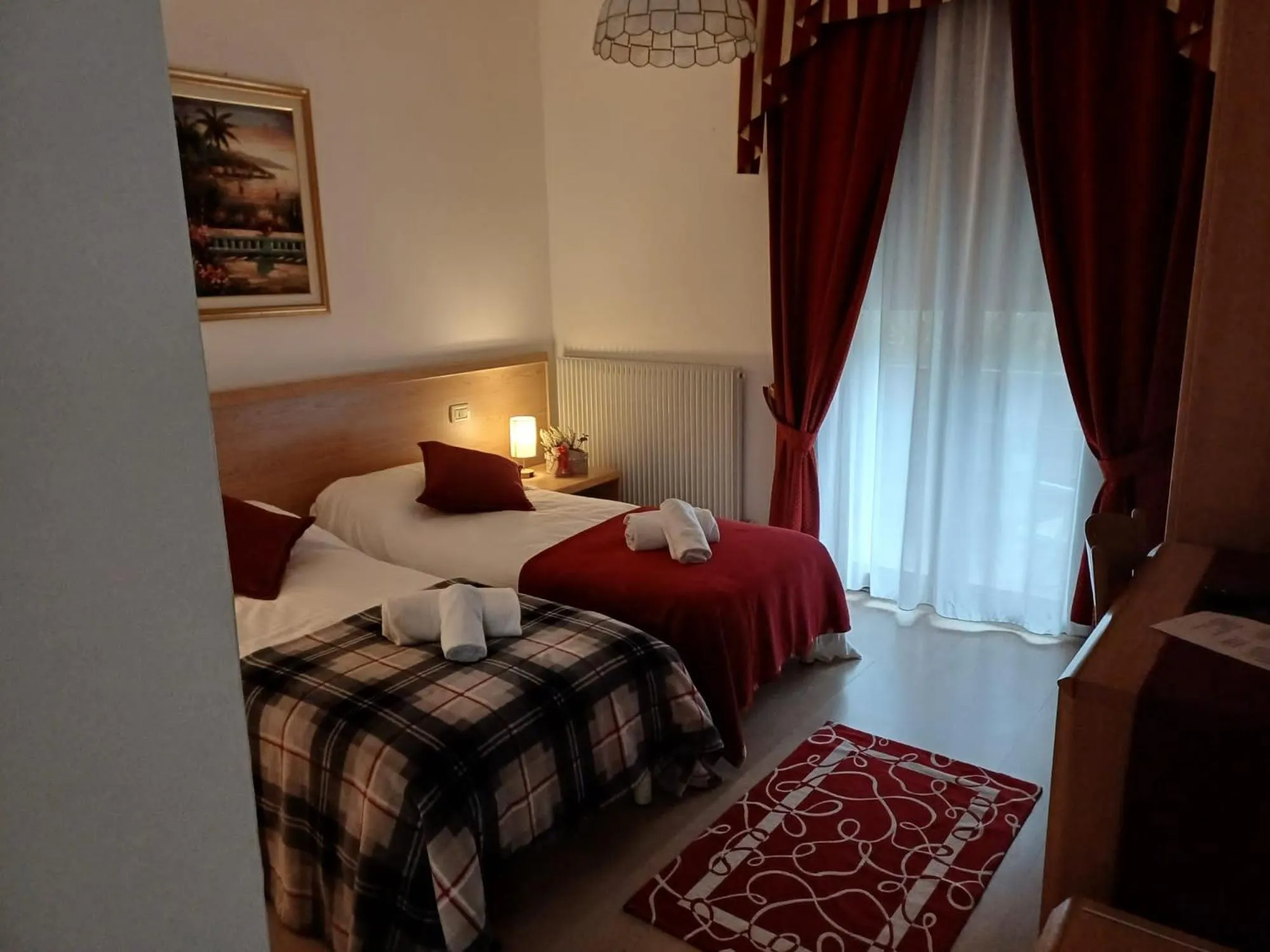 Bed in Albergo Dalla Mena
