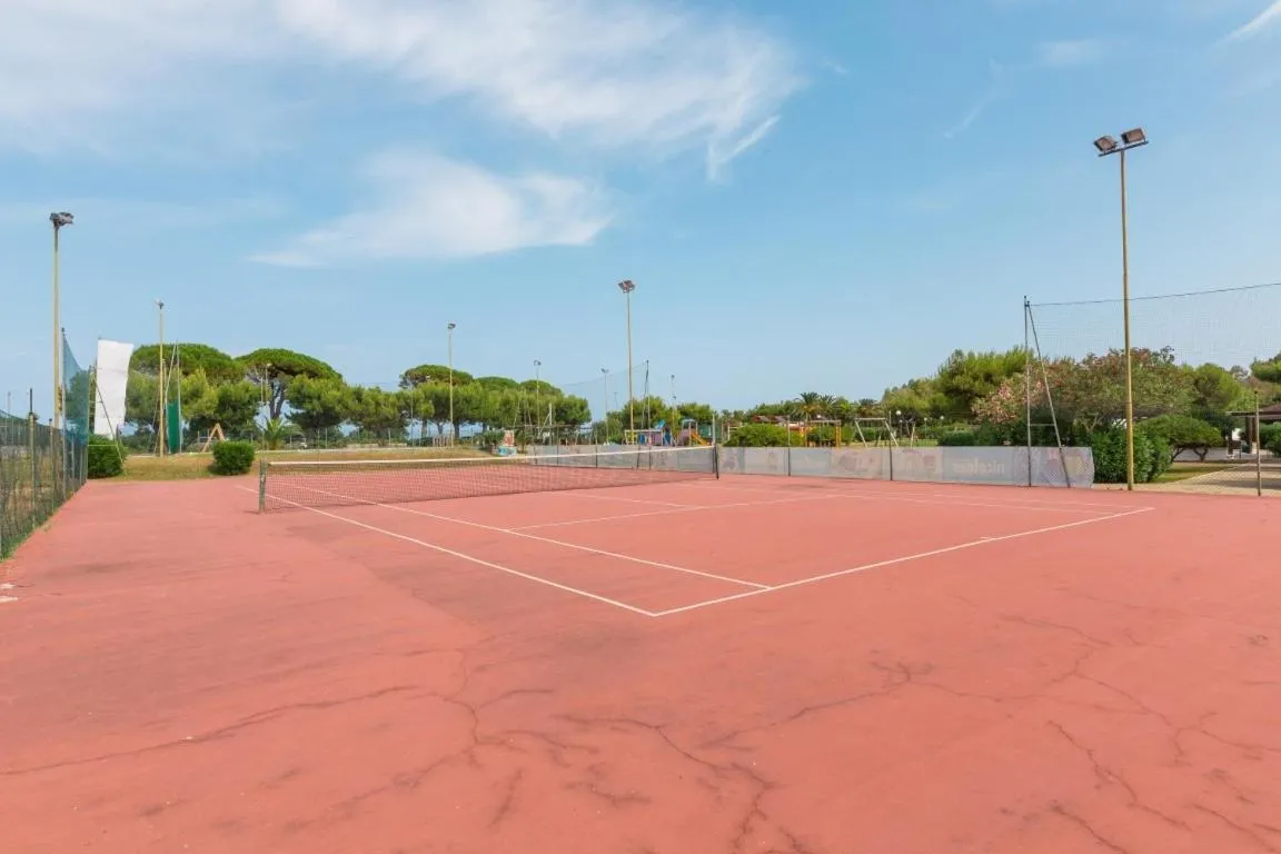 Tennis court in Nicolaus Club Alimini Smile
